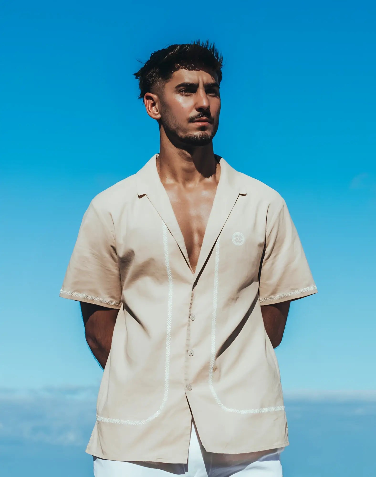 Beige 2EROS Santorini short-sleeved button-up shirt with white embroidered trim on placket and pocket edges in taupe