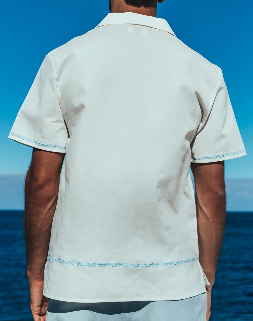 2eros santorini shirt white with subtle light blue embroidered trim on cuffs and hem in a crisp short-sleeved style