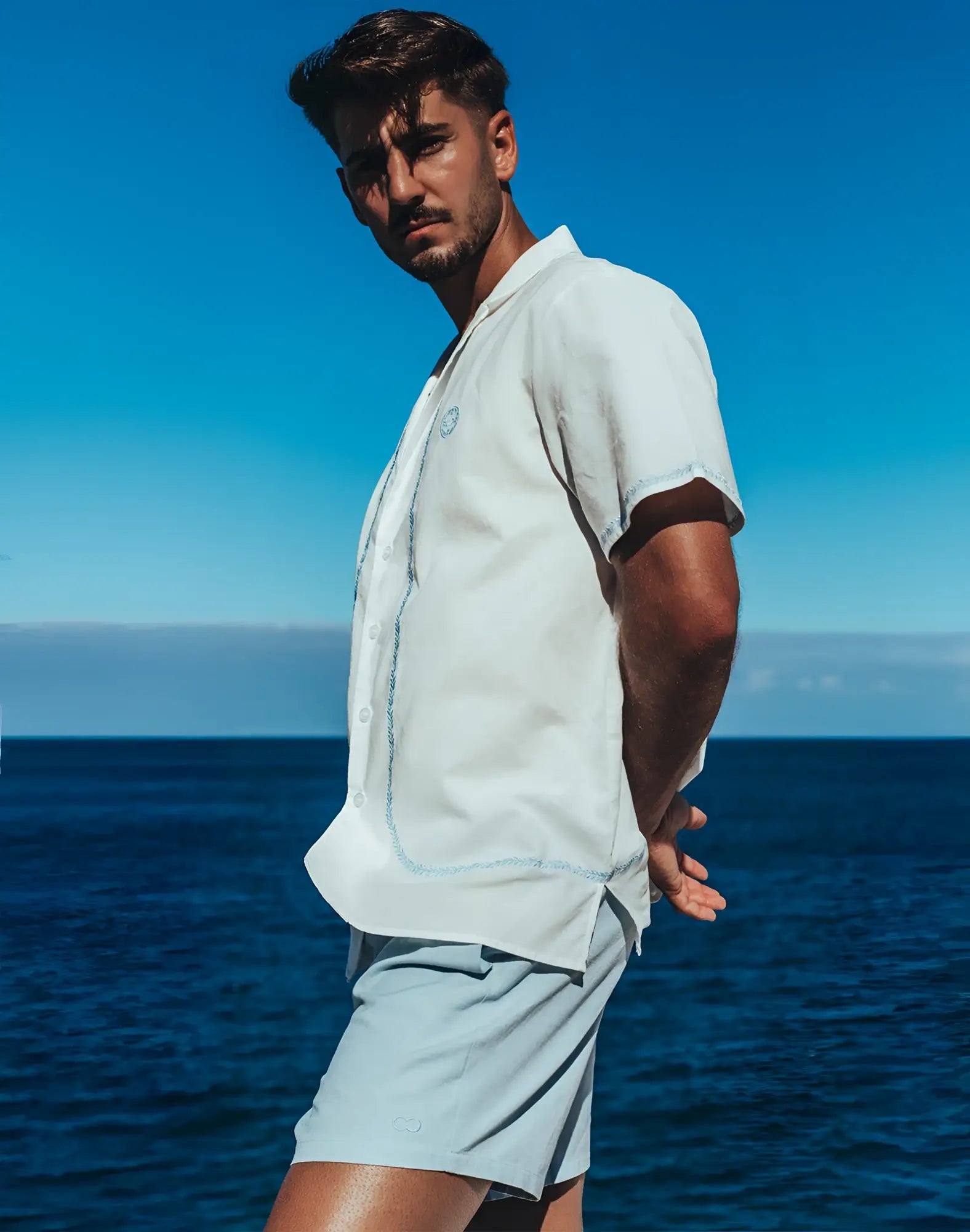 Light blue short-sleeved 2EROS Santorini shirt with subtle stitching details in white and navy colors
