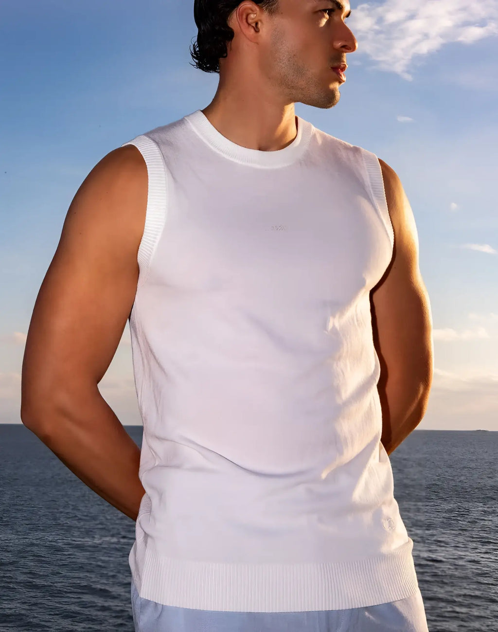 White ribbed knit sleeveless top with crew neckline and tailored fit from 2EROS sapphire knit vest collection