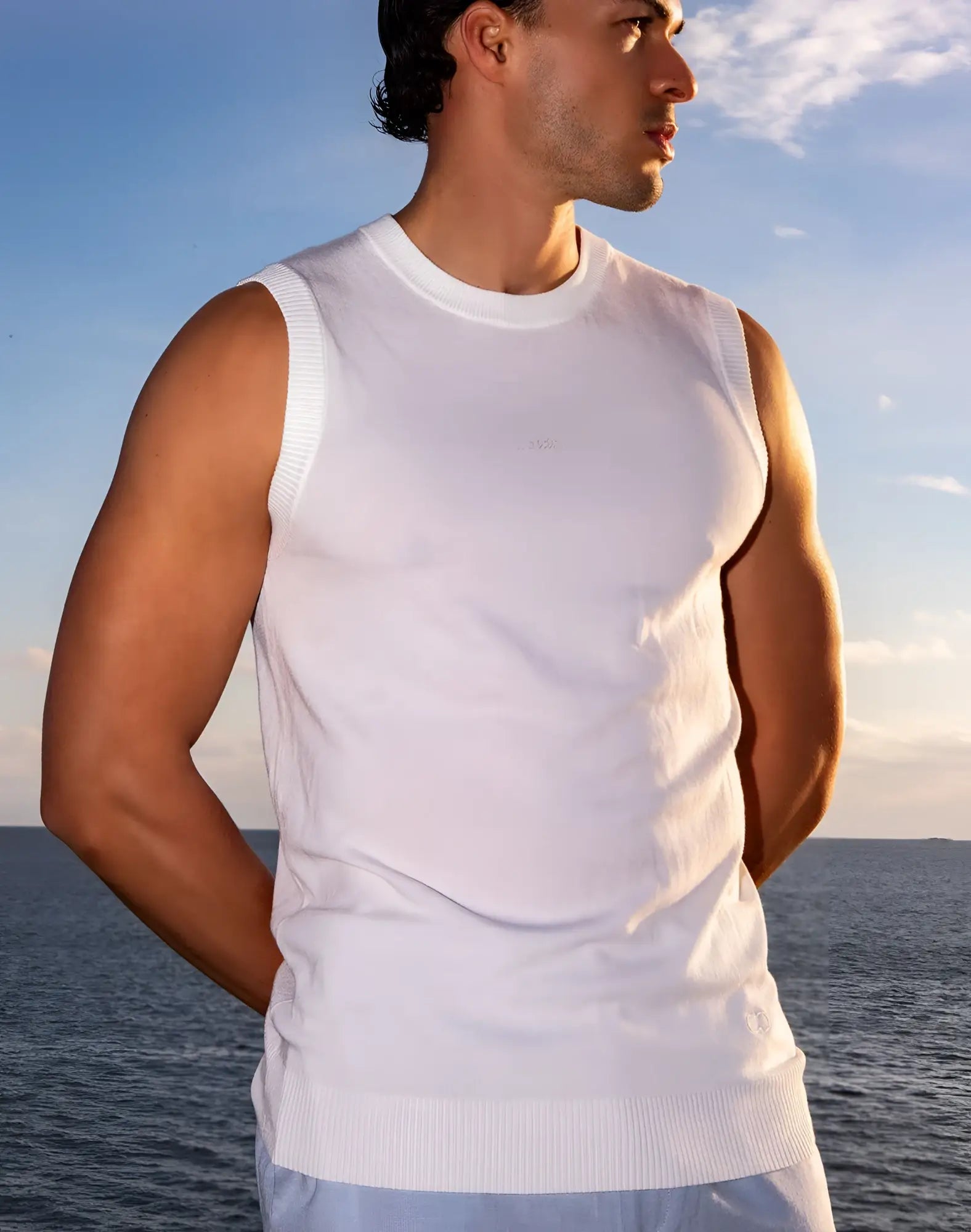 White ribbed knit sleeveless top with crew neckline and tailored fit from 2EROS sapphire knit vest collection