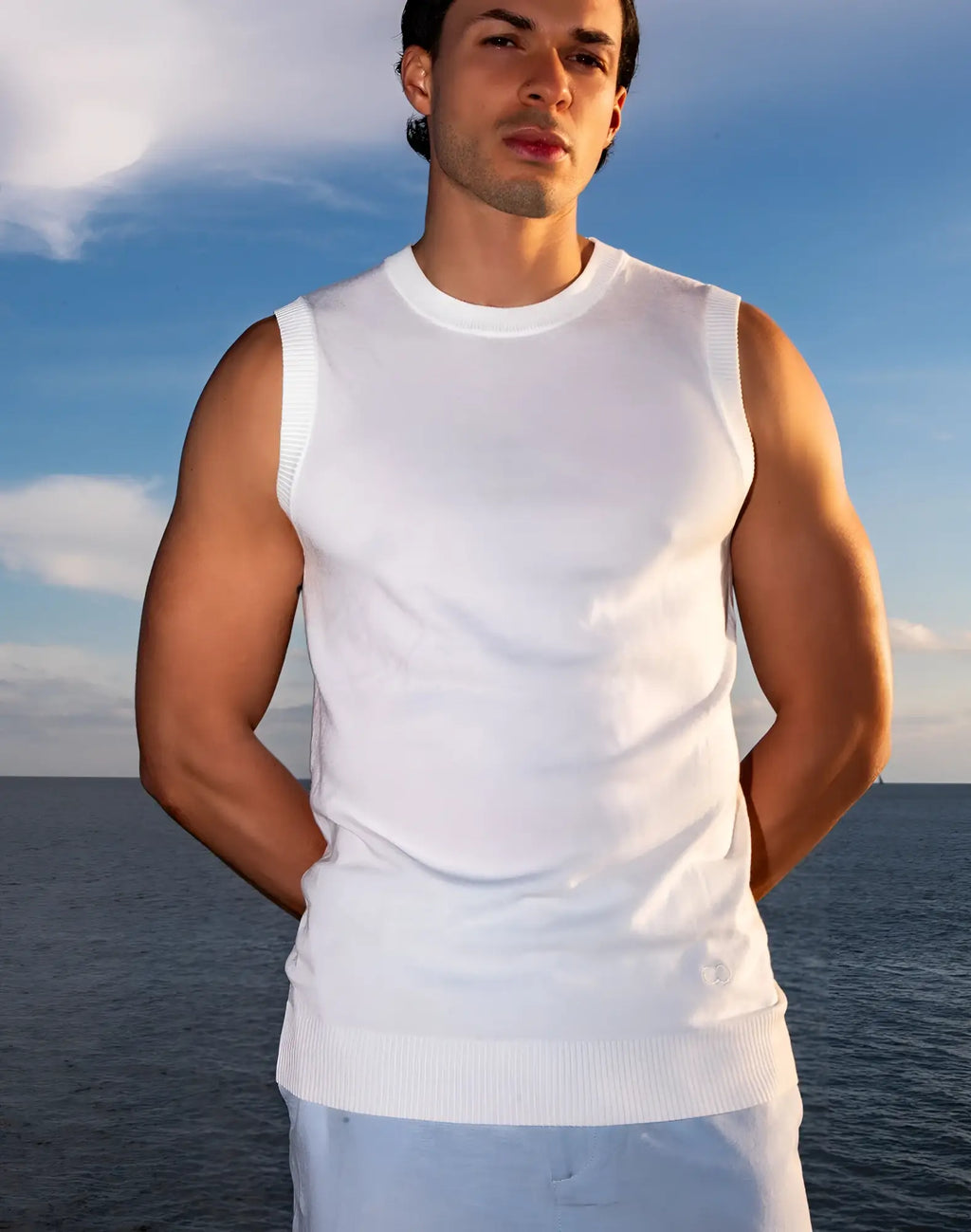 White ribbed knit sleeveless top with crew neckline and hem from 2EROS sapphire knit vest collection