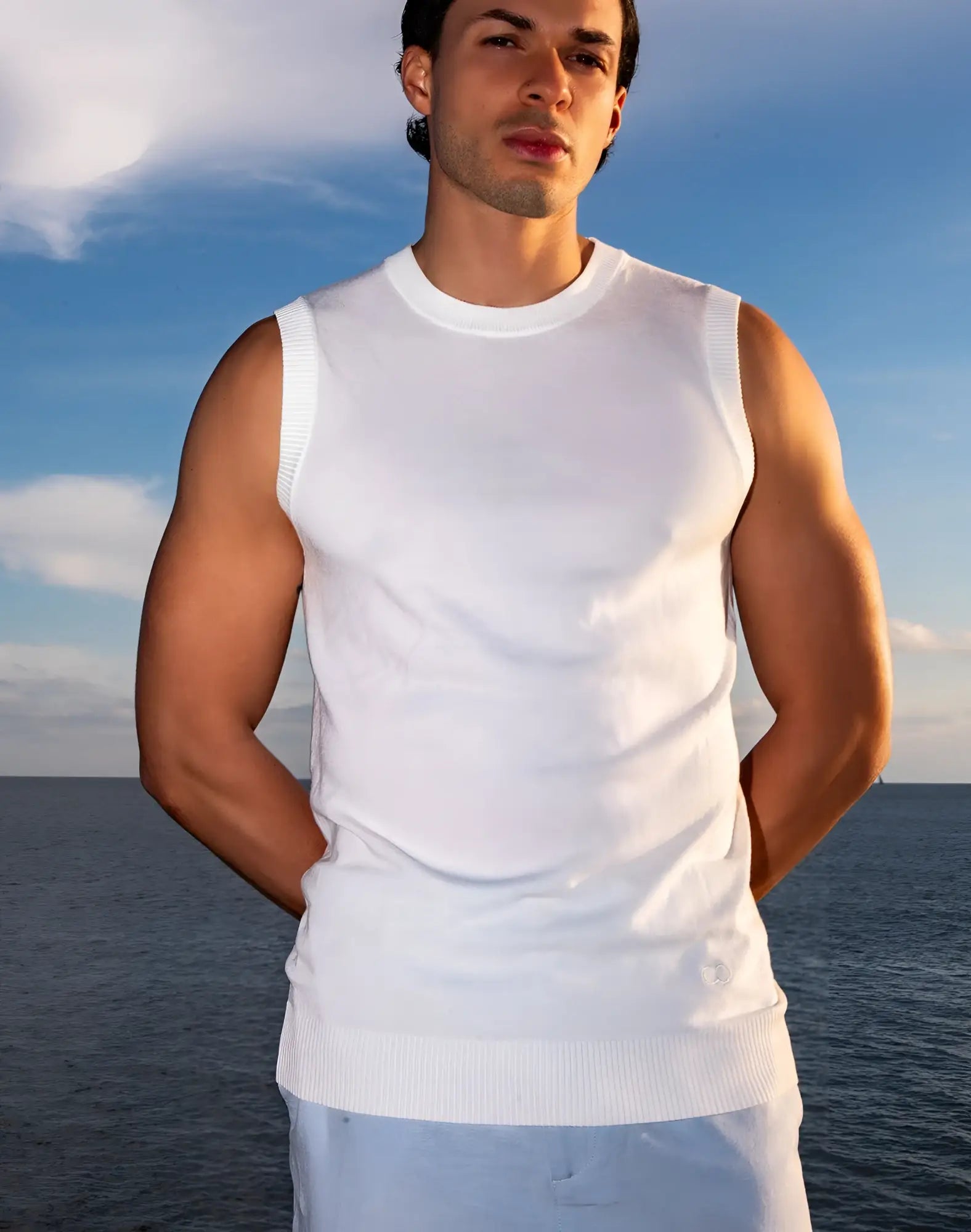 White ribbed knit sleeveless top with crew neckline and hem from 2EROS sapphire knit vest collection