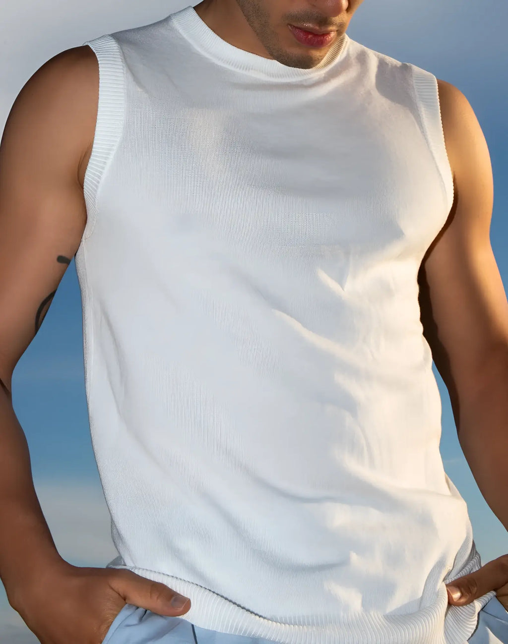 White ribbed knit sleeveless top with crew neckline from 2EROS sapphire knit vest collection