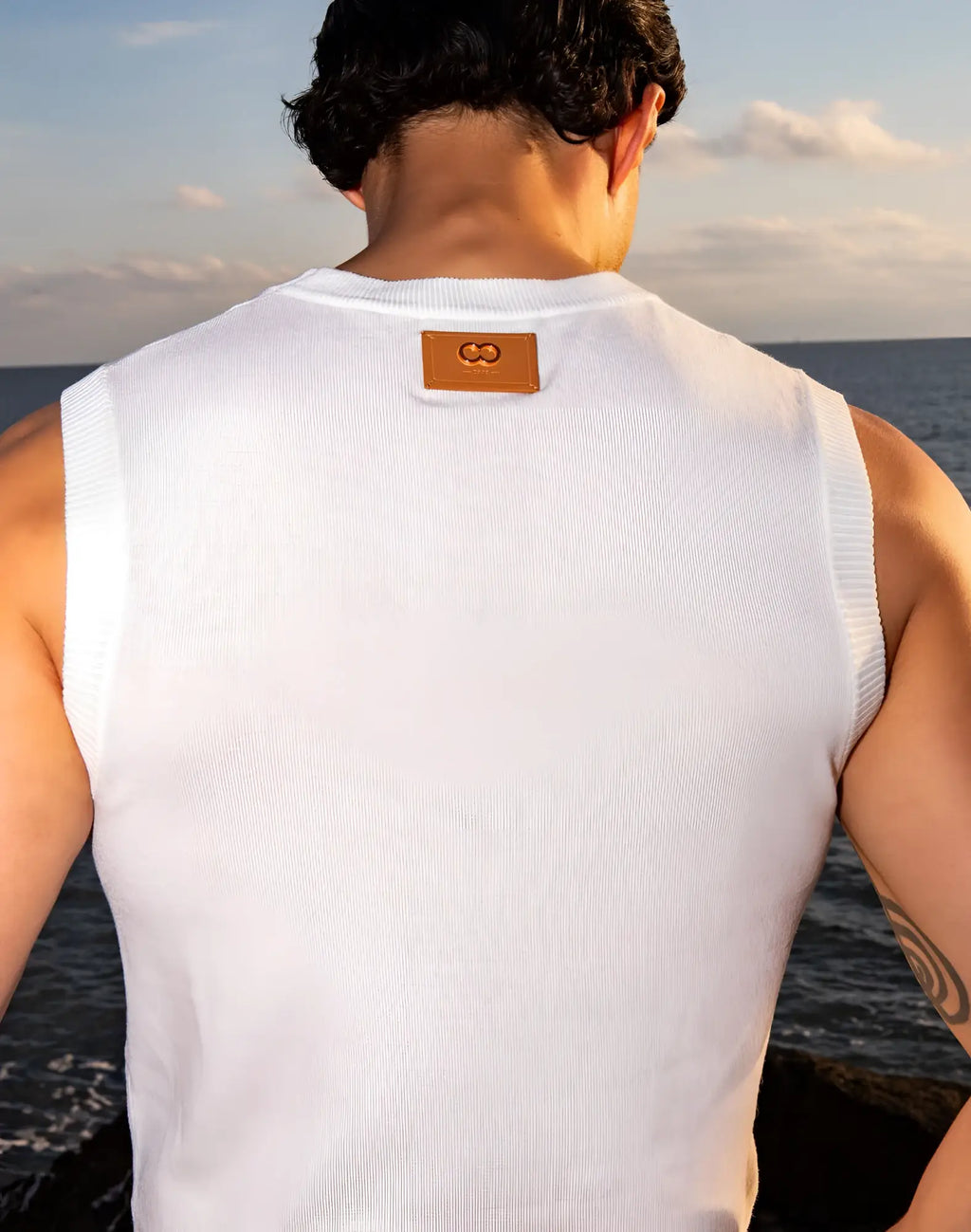 White ribbed knit sleeveless vest with tan leather patch neckline 2EROS sapphire knit vest white
