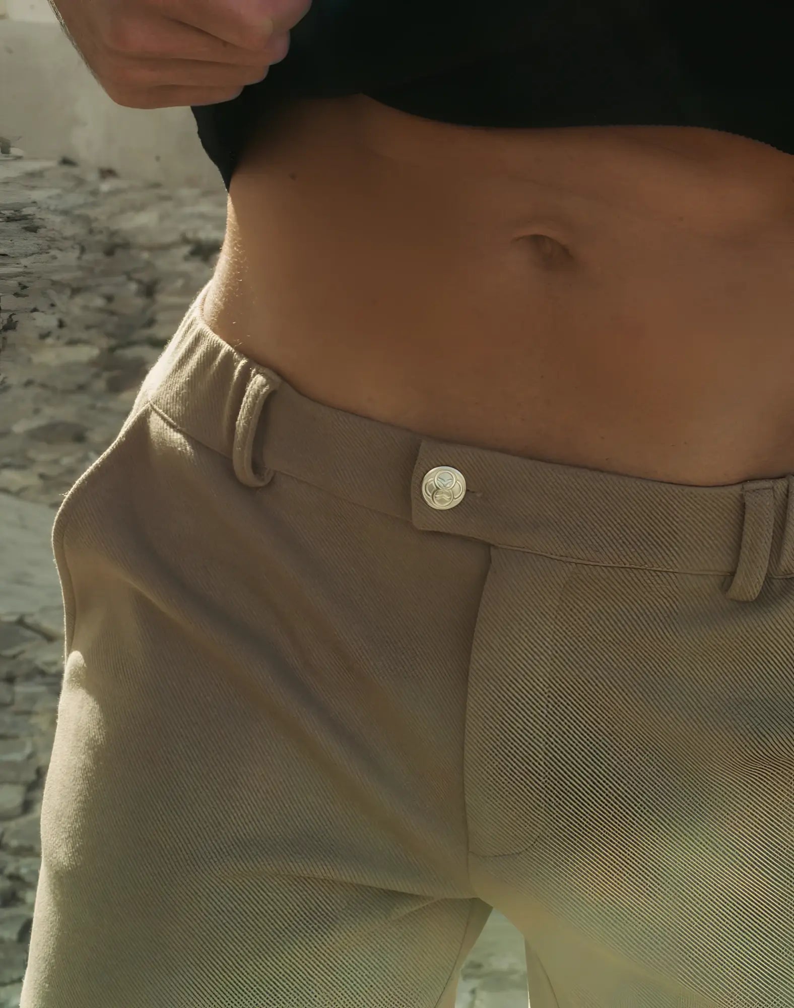 Beige chino trousers taupe 2eros trinity shorts with silver button and belt loop detail in front view