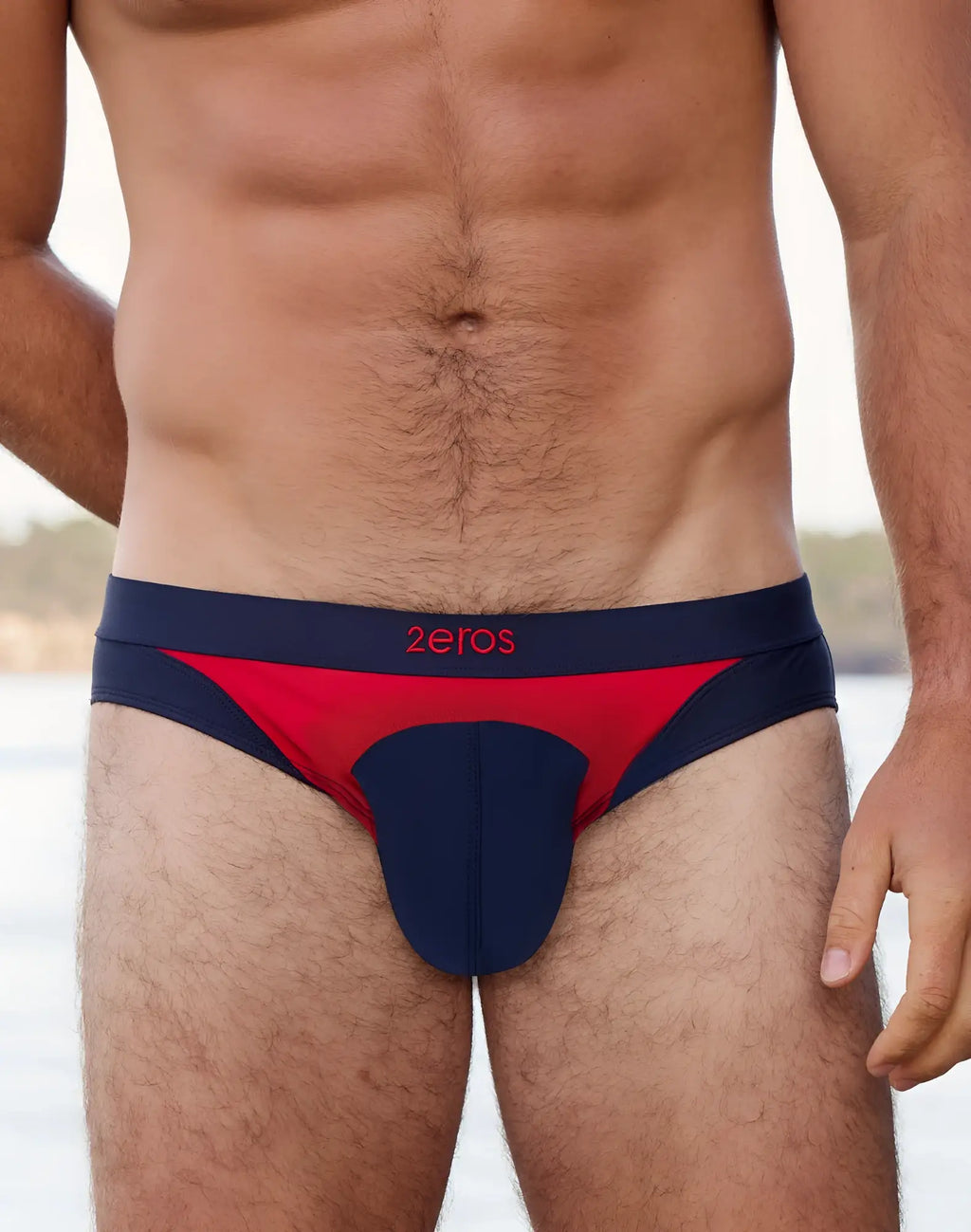 Navy blue and red 2EROS V10 AKTIV racer swim briefs with logo waistband designed for athletic swim use