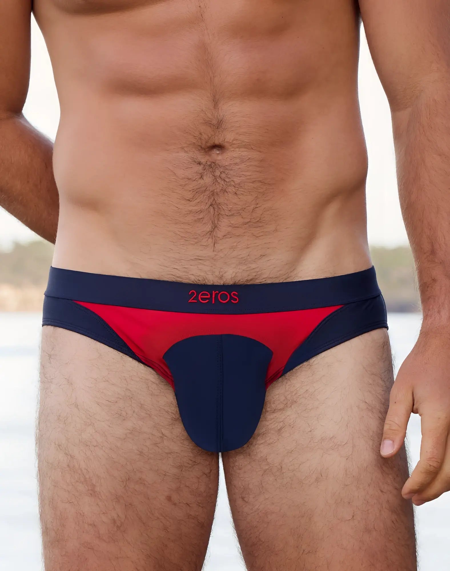 Navy blue and red 2EROS V10 AKTIV racer swim briefs with logo waistband designed for athletic swim use
