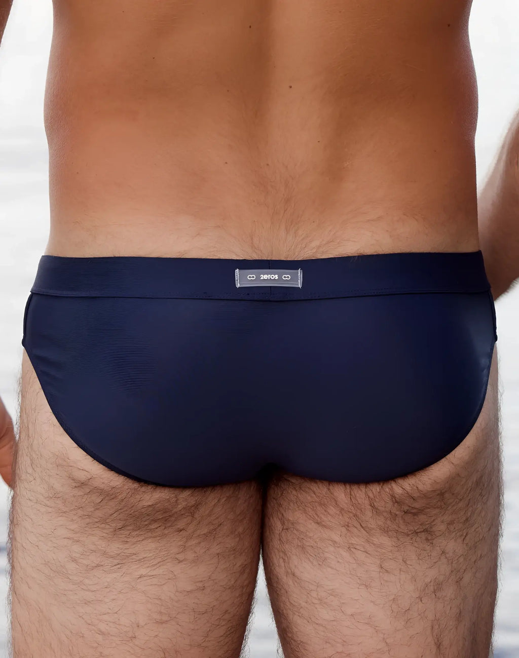 Navy 2EROS V10 AKTIV racer swim briefs with subtle textured finish and branded waistband label for swimwear use