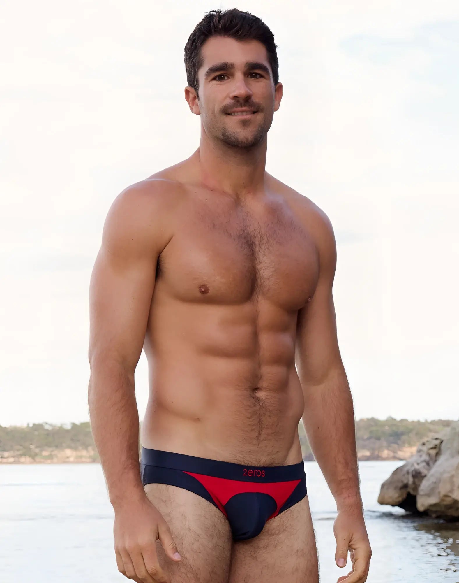 Navy and red 2eros v10 aktiv racer swim briefs with aeros branded waistband designed for athletic use