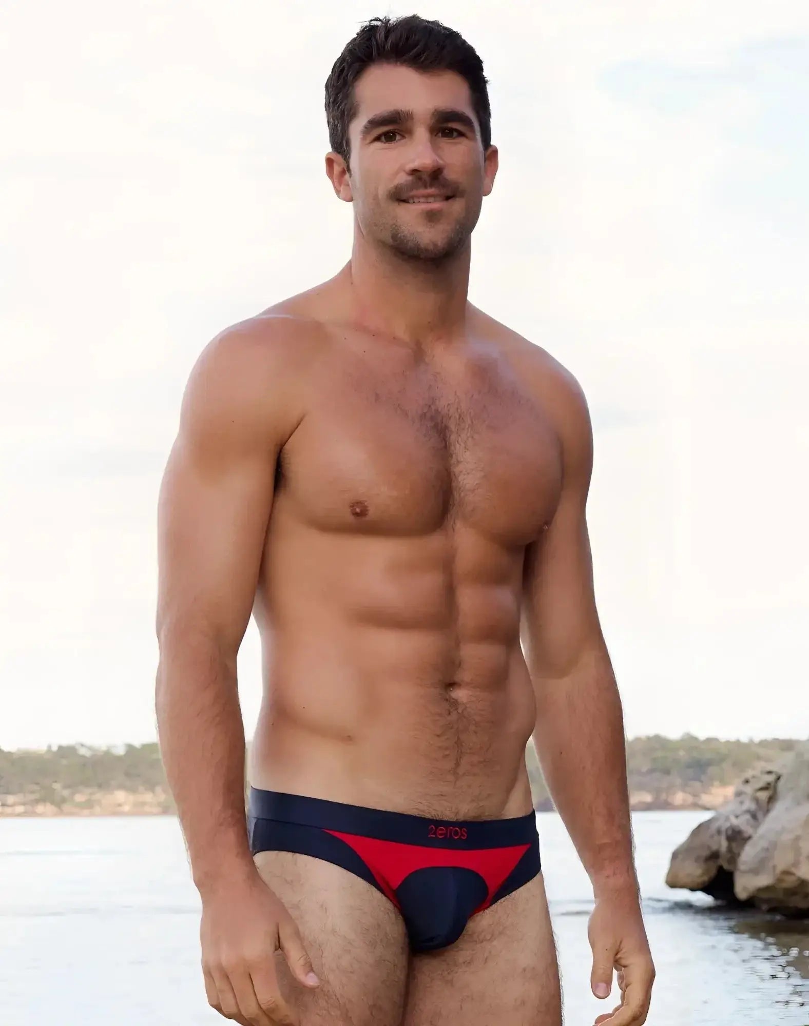 Navy and red 2eros v10 aktiv racer swim briefs with aeros branded waistband designed for athletic use