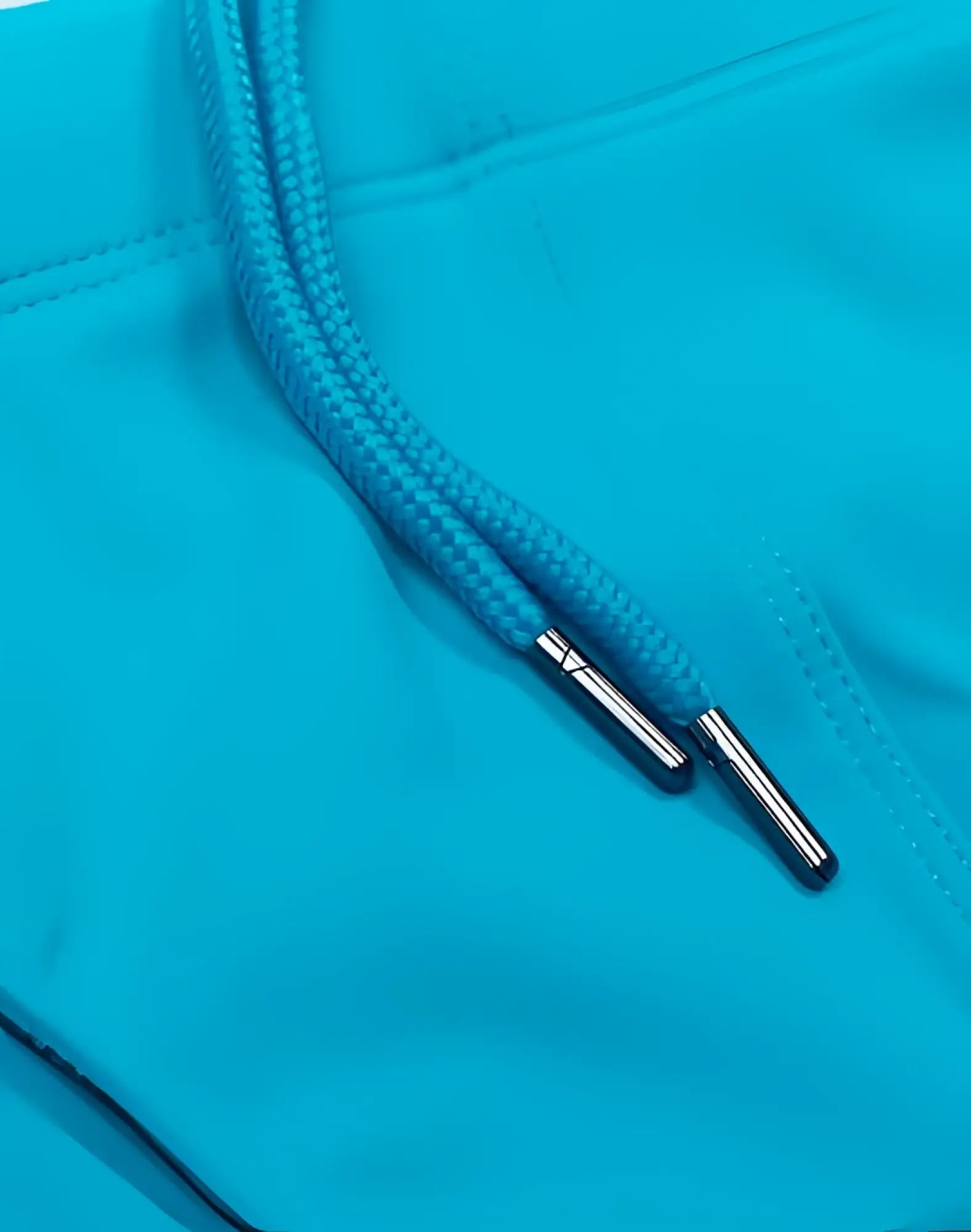 Bright turquoise drawstring with metallic silver aglets on 2eros v10 core series 2 aqua swimwear