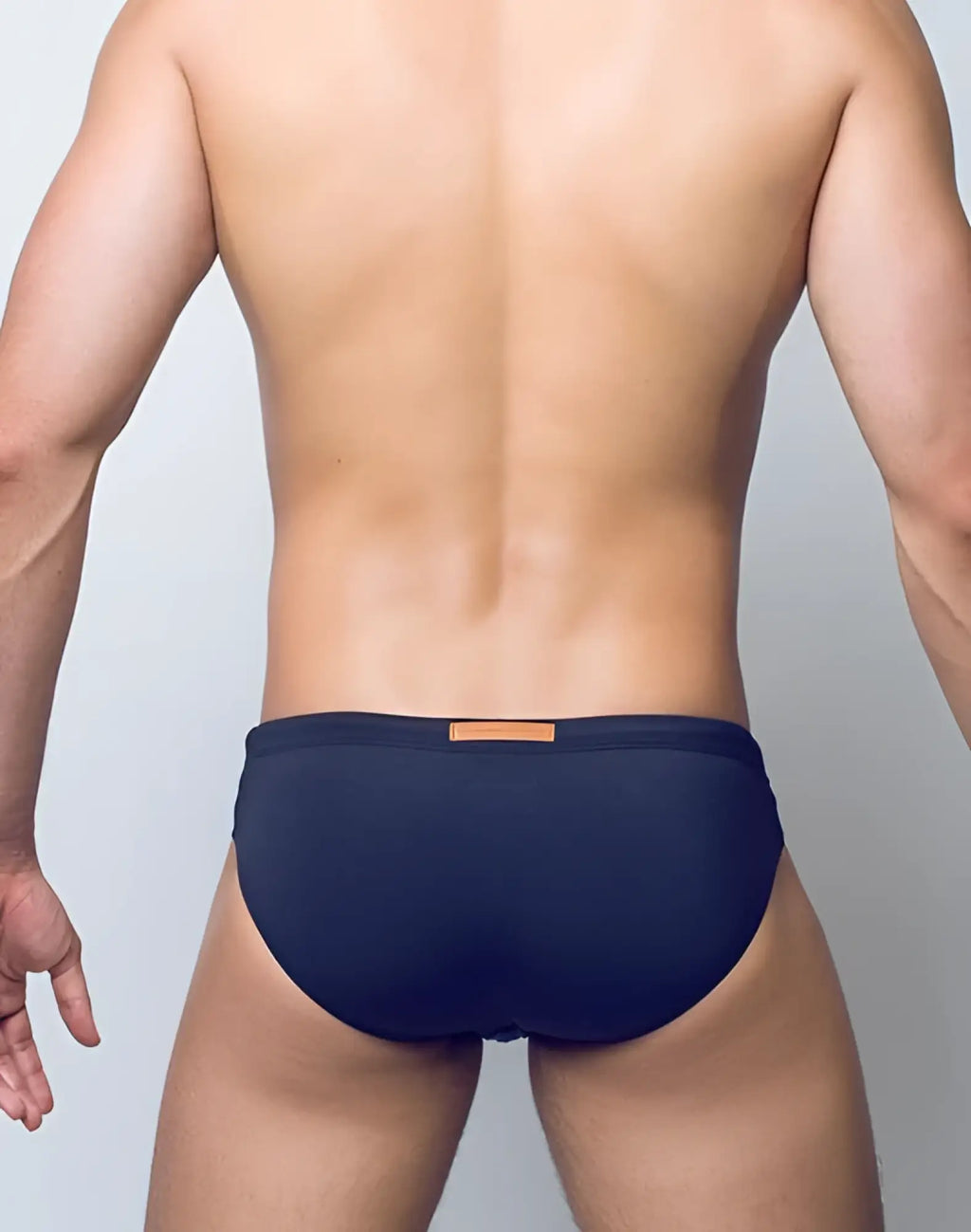 Navy blue 2EROS V10 Core Series 2 briefs with tan leather waistband patch designed for swimwear use black color