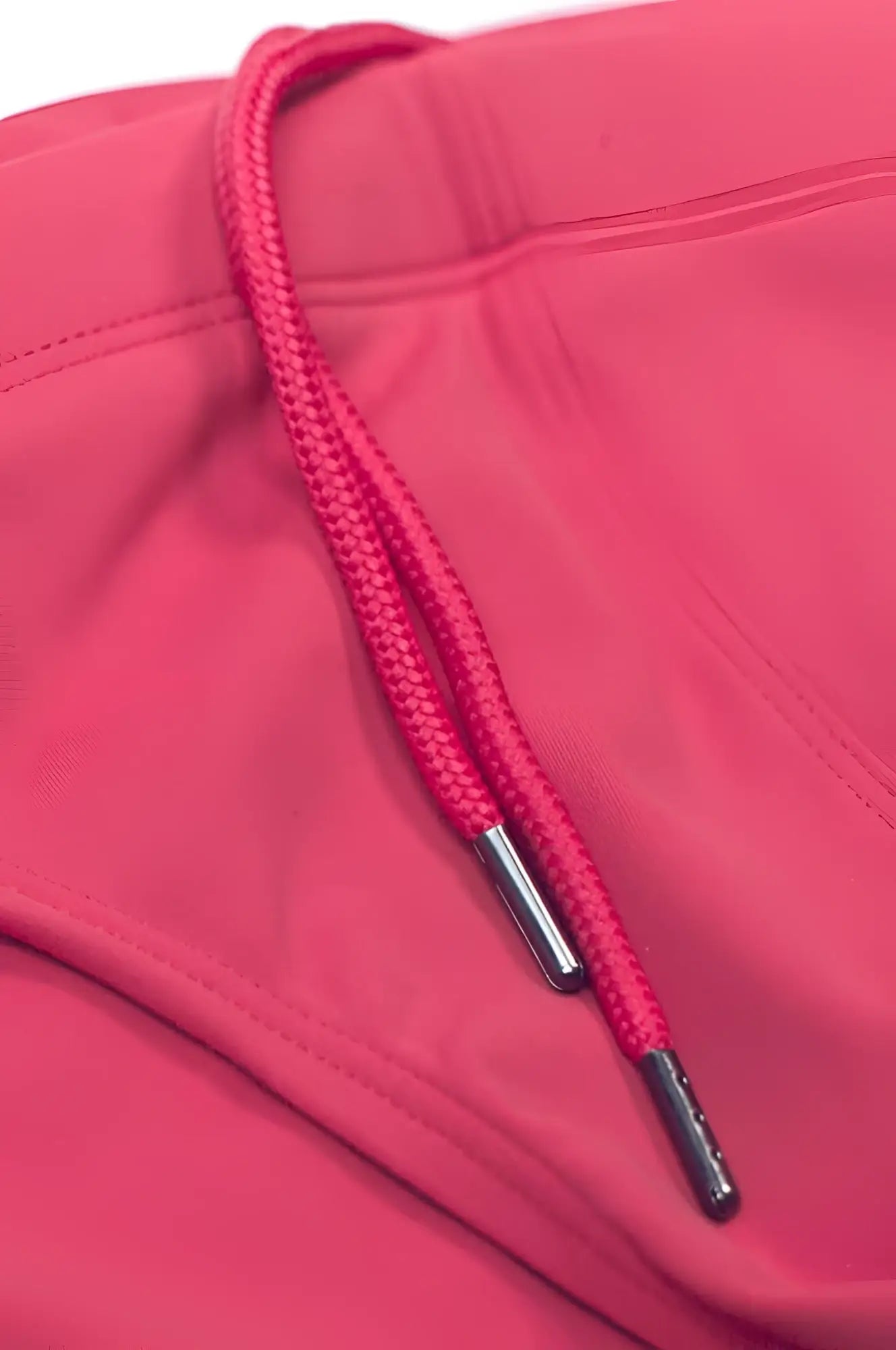 2eros v10 core series 2 swimwear coral with bright pink drawstring and metallic silver aglets for secure fit