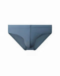 A sleek slate-blue 2EROS V10 Core swimwear brief with smooth form-fitting design and subtle stitching in faded denim