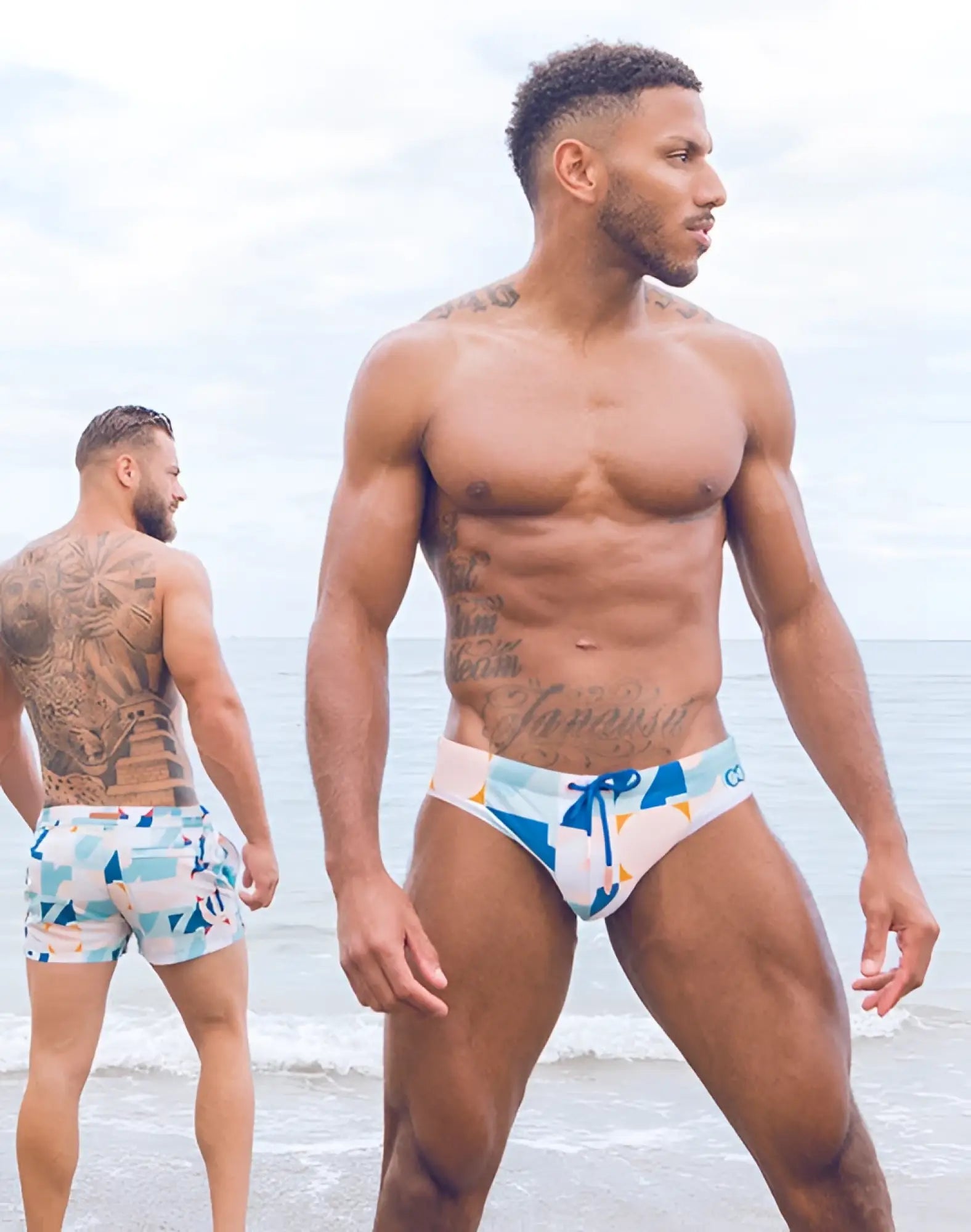 Blue and white patterned 2EROS V10 print swim brief with bow detail in insignia turquoise for swimming use