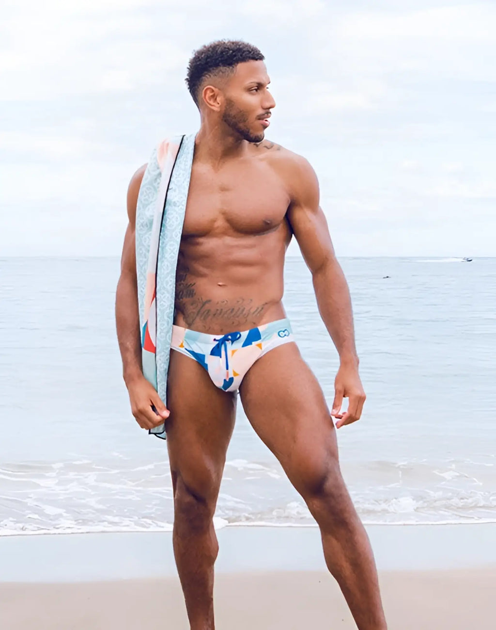 Blue and white patterned 2EROS V10 print swim brief with front bow tie in insignia turquoise for swimming