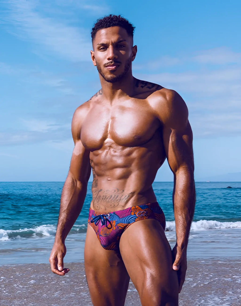 2eros v10 print swim brief stallion navy with vibrant tropical pattern and blue drawstring for beachwear