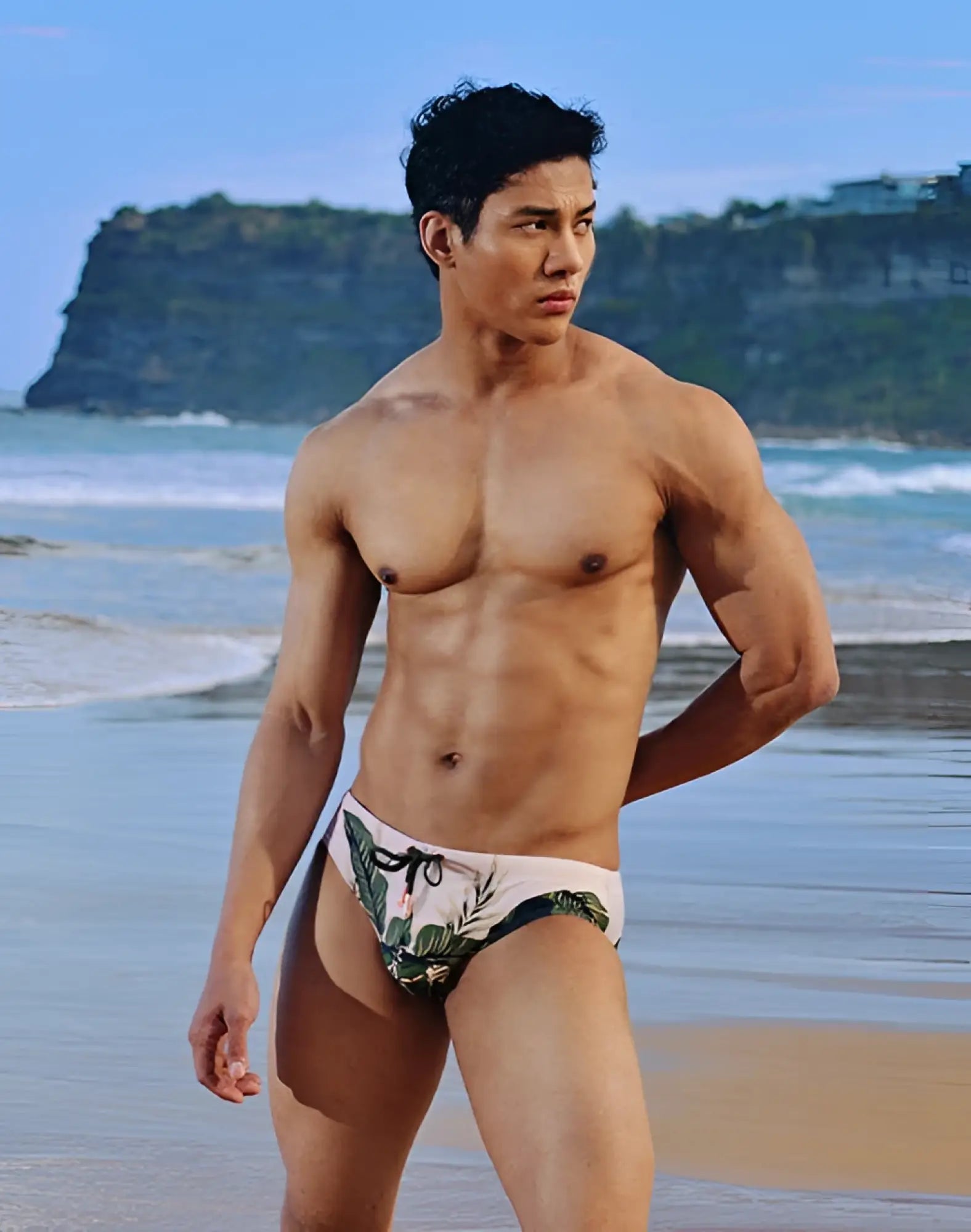 White swim trunks 2EROS V10 Print Swim Exotica with green black and pink tropical leaf and vine pattern