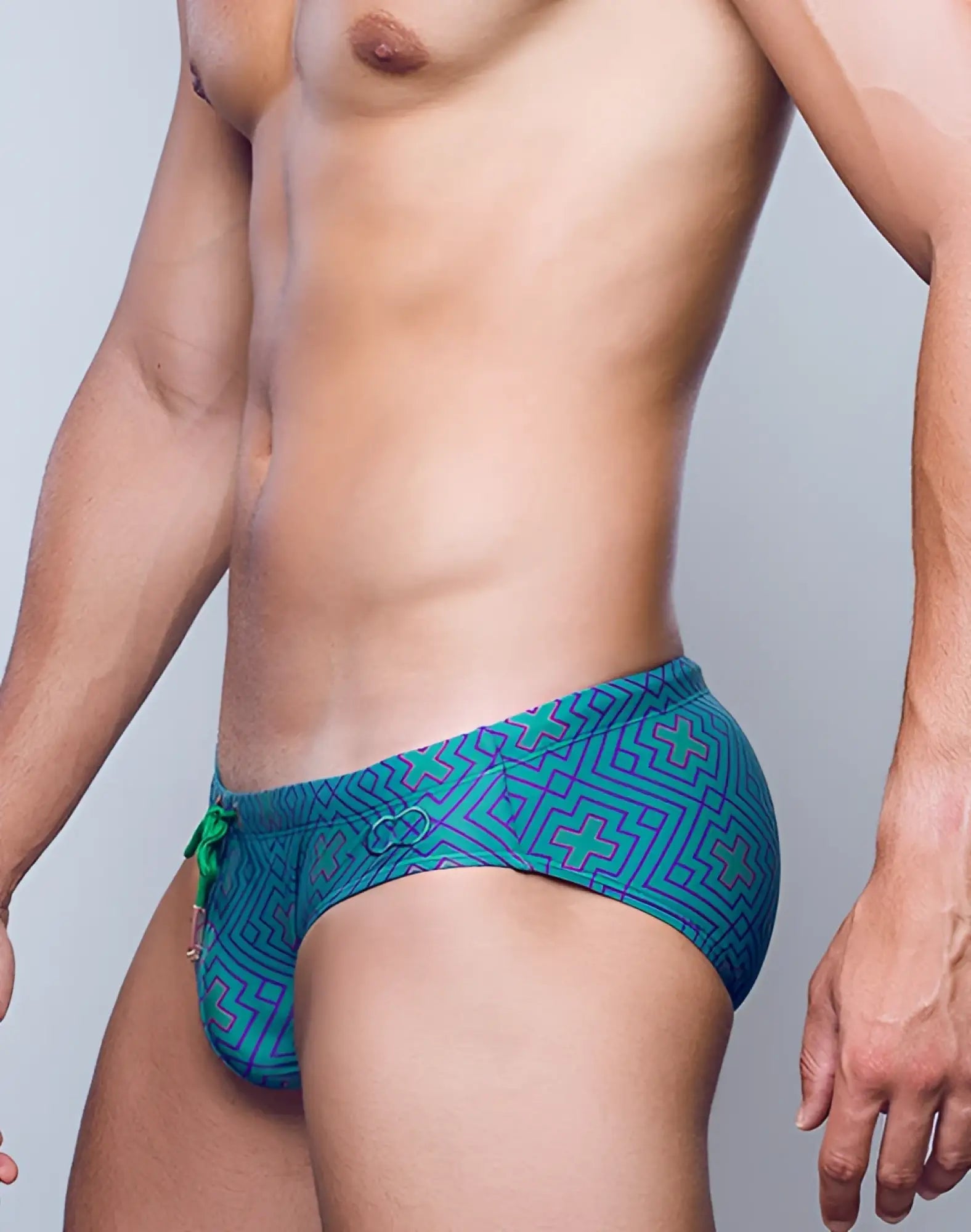 Teal 2EROS V10 Print swimwear with a geometric pattern and green drawstring for active water use