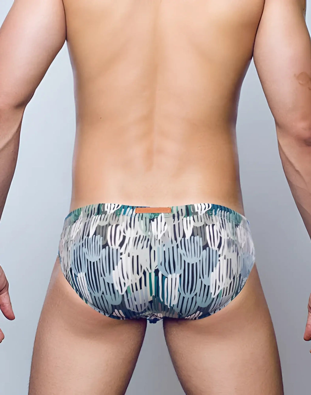 2eros v10 print swimwear torch patterned swim trunks in teal white and gray with modern abstract design