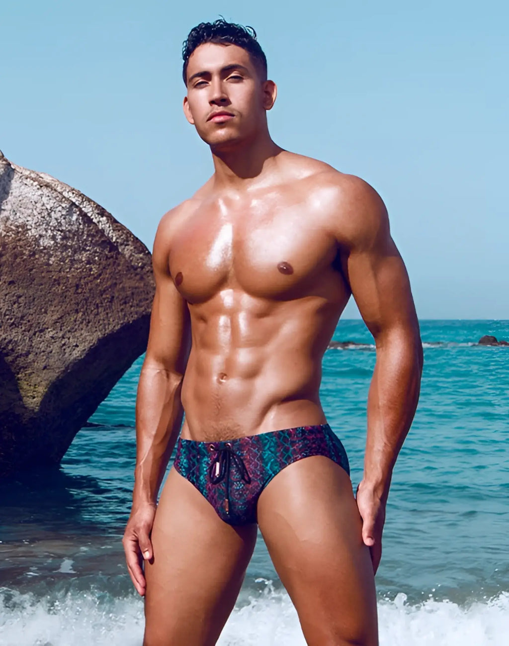 Patterned 2EROS V10 Print swim trunks with vibrant multicolored design in shades of blue and purple for swimwear use