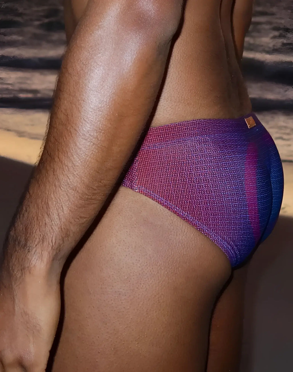 Purple and blue gradient 2EROS V10 printed swim brief with textured woven pattern for swimming and beachwear