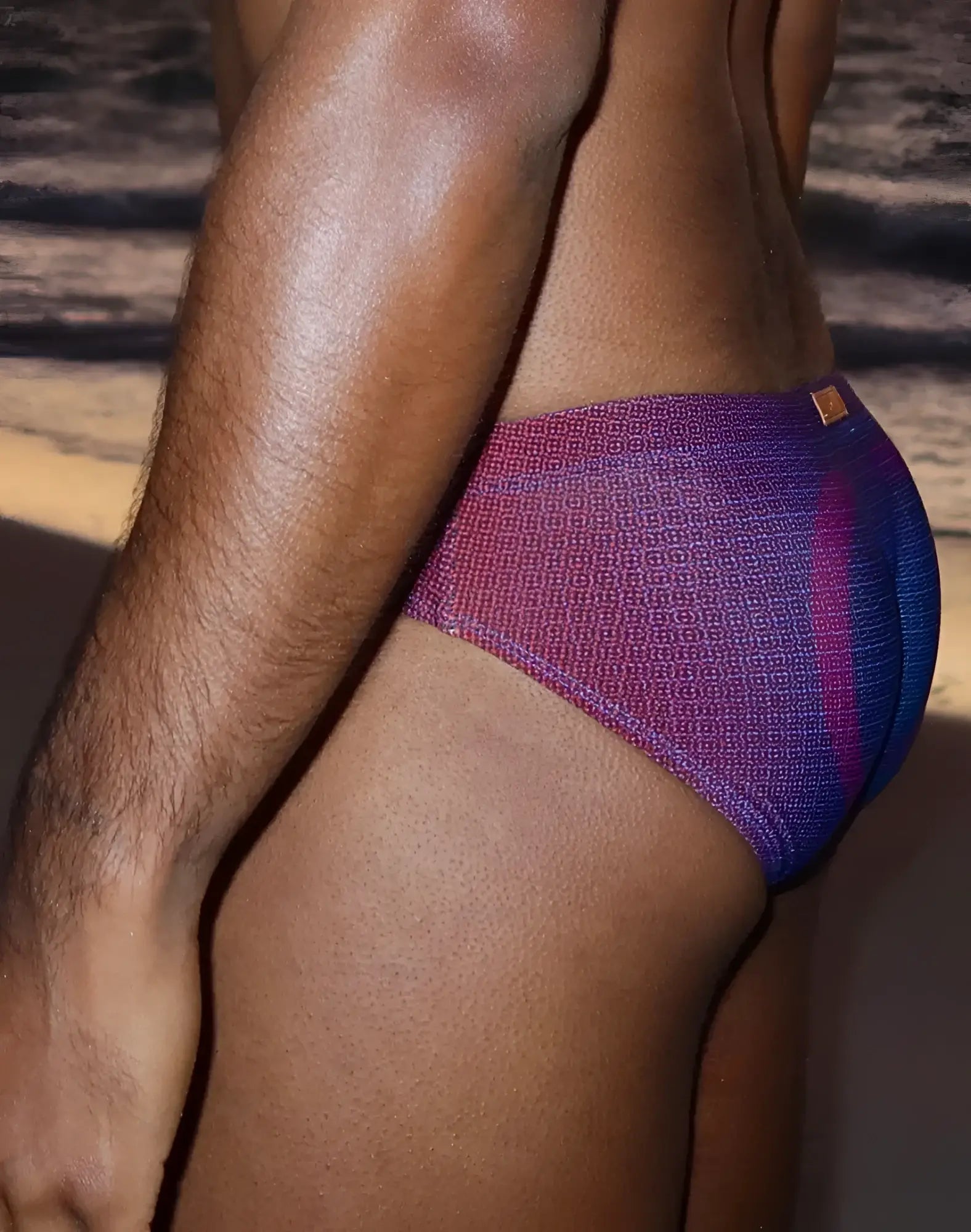 Purple and blue gradient 2EROS V10 printed swim brief with textured woven pattern for swimming and beachwear