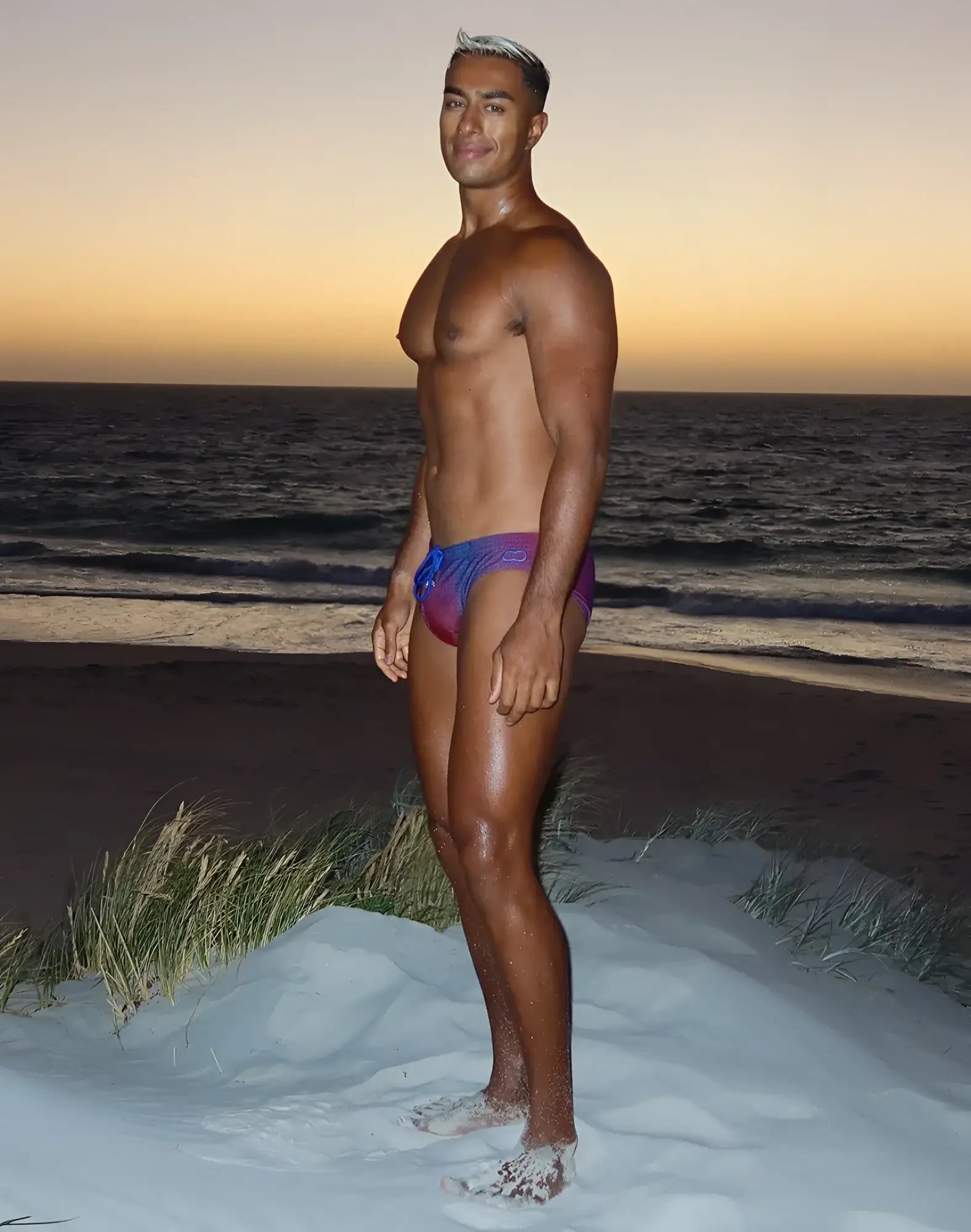2eros v10 printed swim brief pixelpop in vibrant purple and blue gradient swim trunks with a sleek modern design