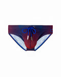 2EROS V10 printed swim brief in vibrant blue to red gradient with bold blue drawstrings and white inner lining