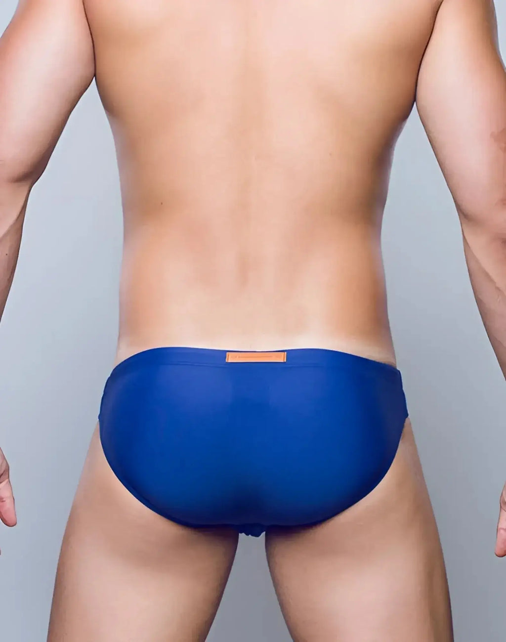 Blue 2EROS V20 core swim trunks with a small orange label on the waistband designed for swimming and beach use