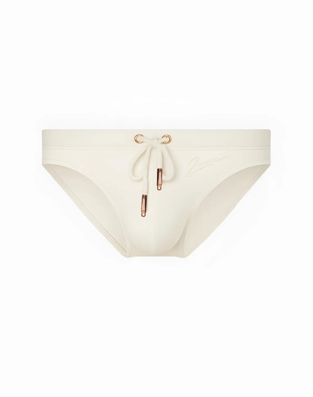 Cream-colored 2EROS V20 Core swim trunks with drawstring closure and rose gold metal accents in sand color