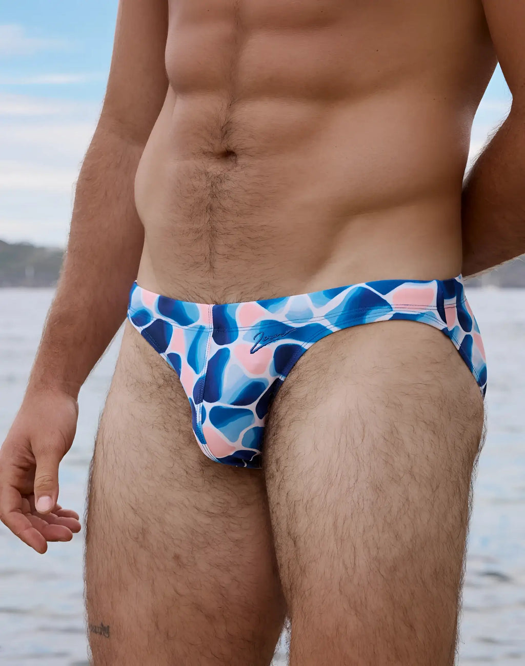 2eros v20 printed swim brief in aqua navy with blue and pink abstract pattern designed for swimming