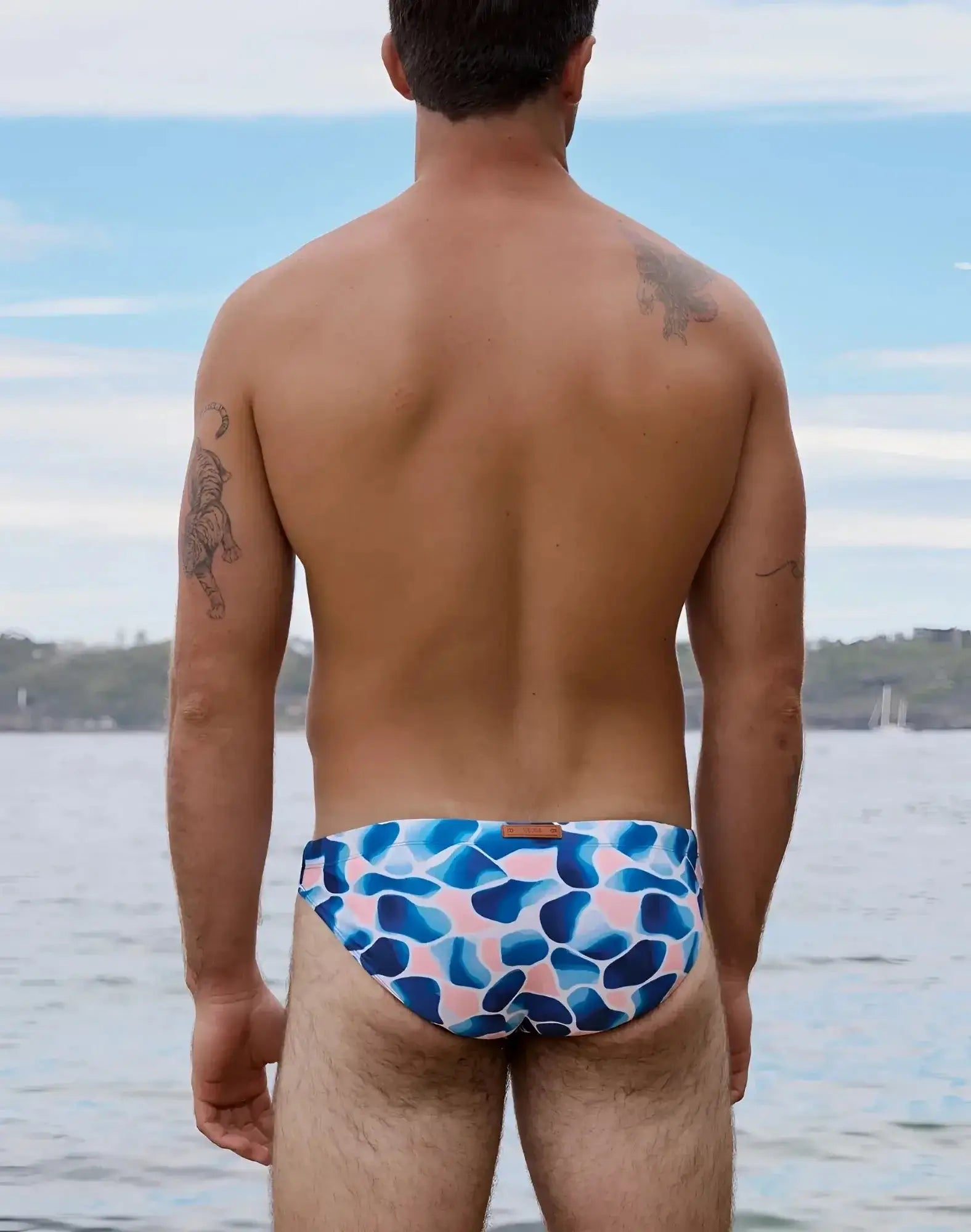2eros v20 printed swim brief in aqua navy featuring blue and pink abstract patterns for swimming and beachwear