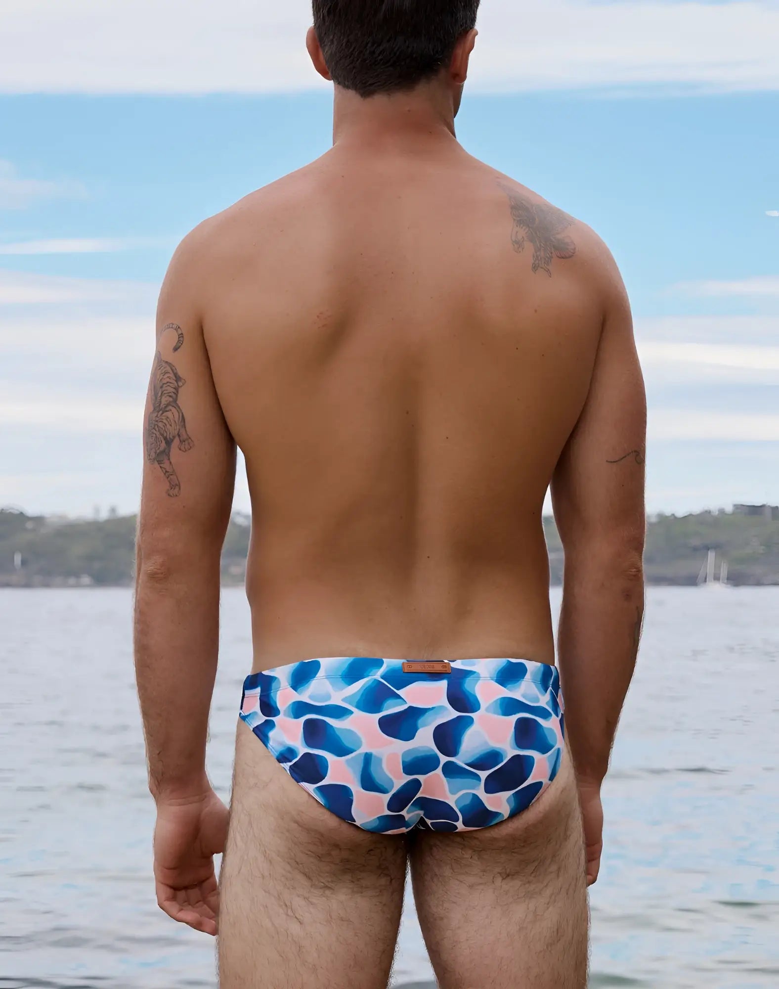 2eros v20 printed swim brief in aqua navy featuring blue and pink abstract patterns for swimming and beachwear