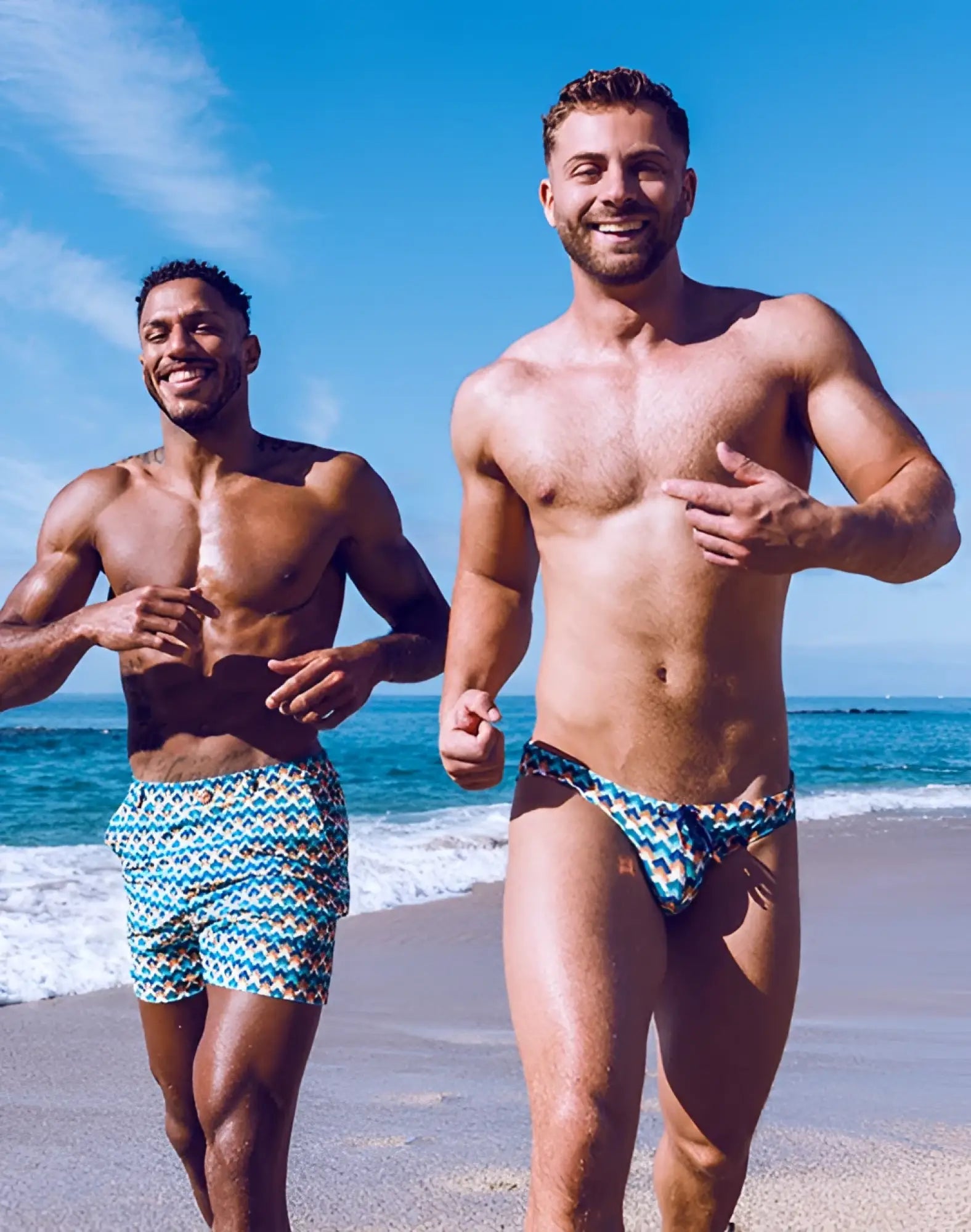 Men’s 2EROS V20 printed swim brief in chevy blue featuring teal and white geometric patterned fabric