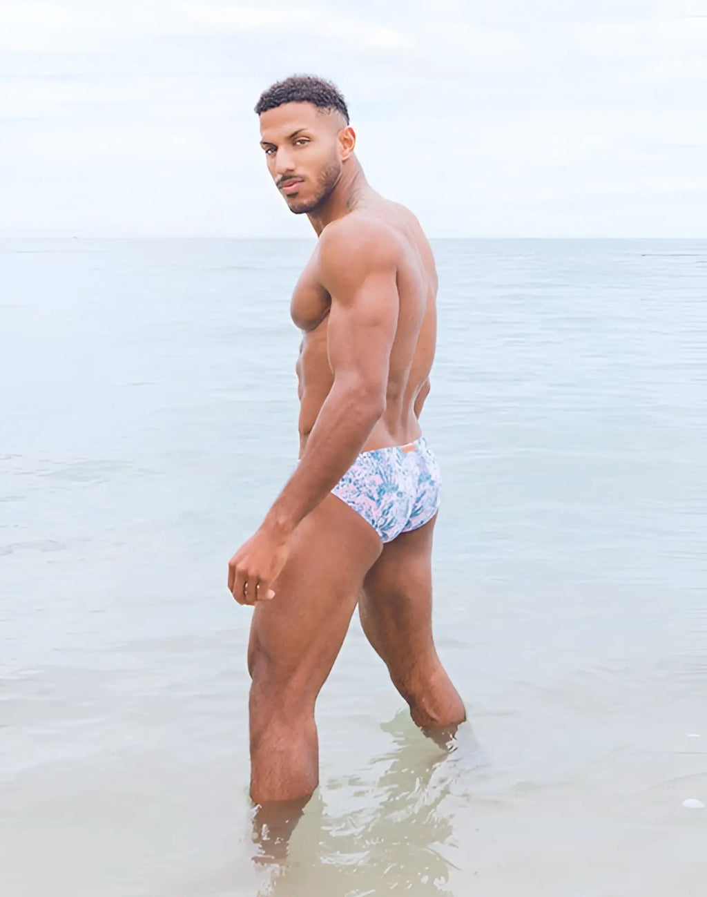 Blue and white patterned 2EROS V20 printed swim brief in coral teal designed for comfortable swimwear use