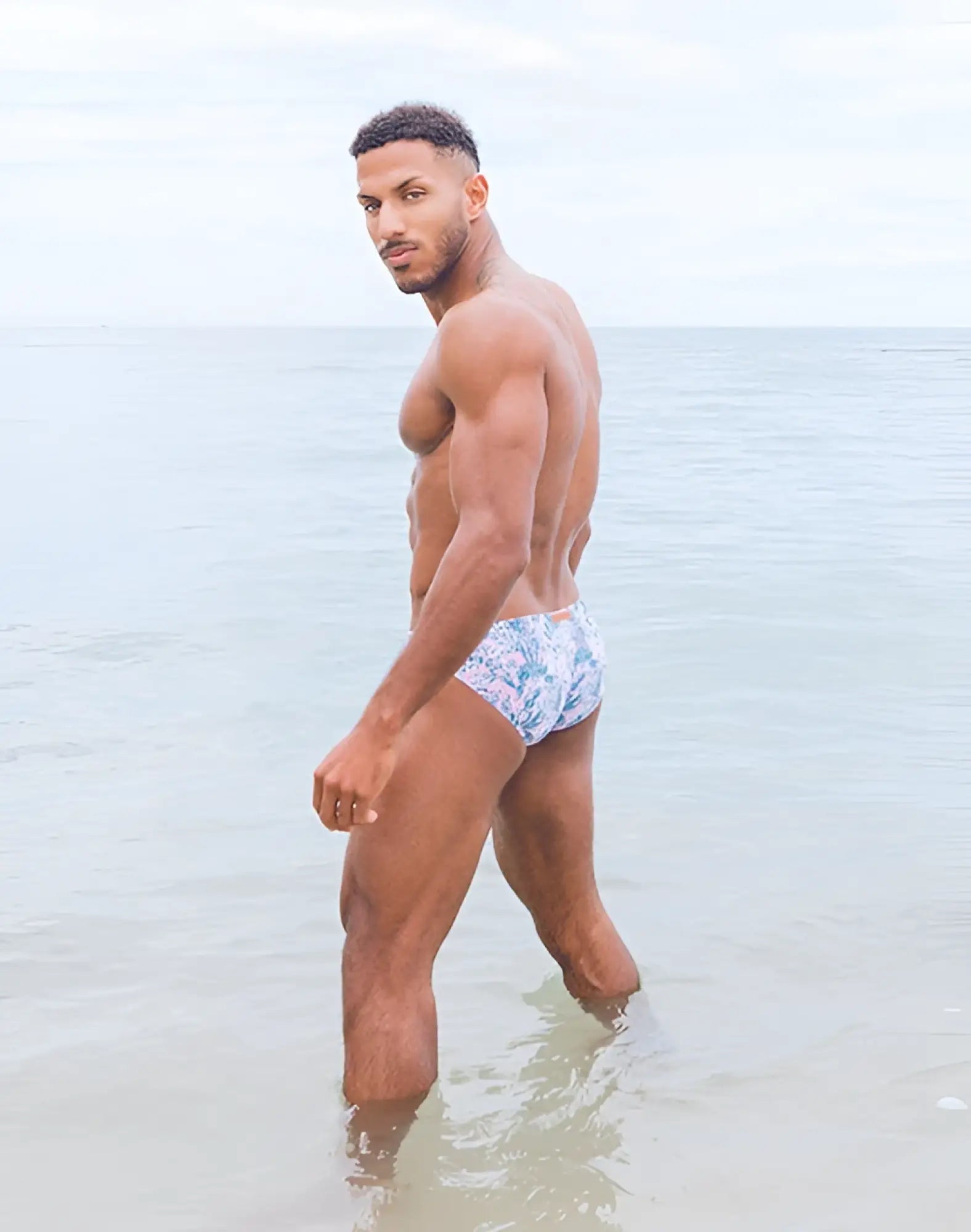 Blue and white patterned 2EROS V20 printed swim brief in coral teal designed for comfortable swimwear use