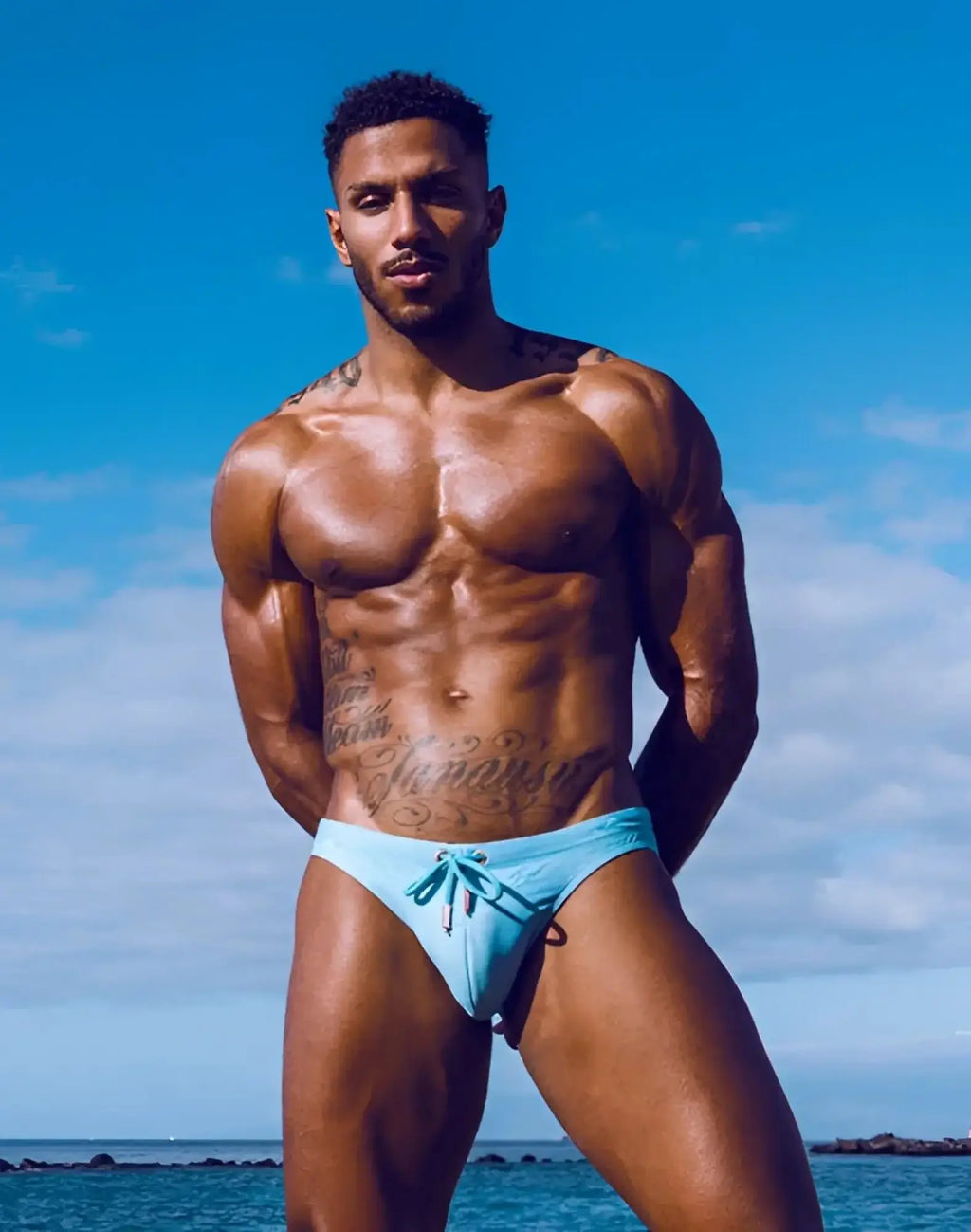 Light blue 2EROS V20 printed swim brief with drawstring waistband for comfortable beachwear in Nautica Green shade