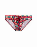Vibrant 2EROS V20 printed swim brief featuring mermaid-scale pattern, red drawstring, and metallic silver hardware