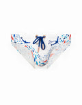 White swim trunks by 2EROS featuring vibrant blue and red shark print with navy blue drawstrings in seascape white
