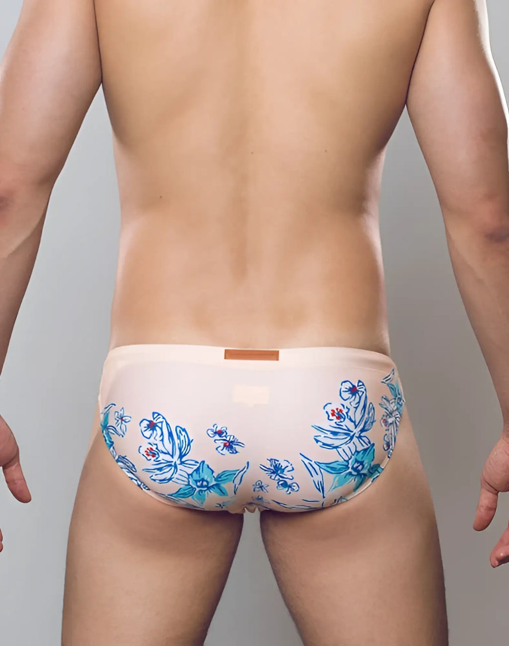 Beige 2eros v20 printed swim brief with delicate blue floral pattern in tahiti peach color