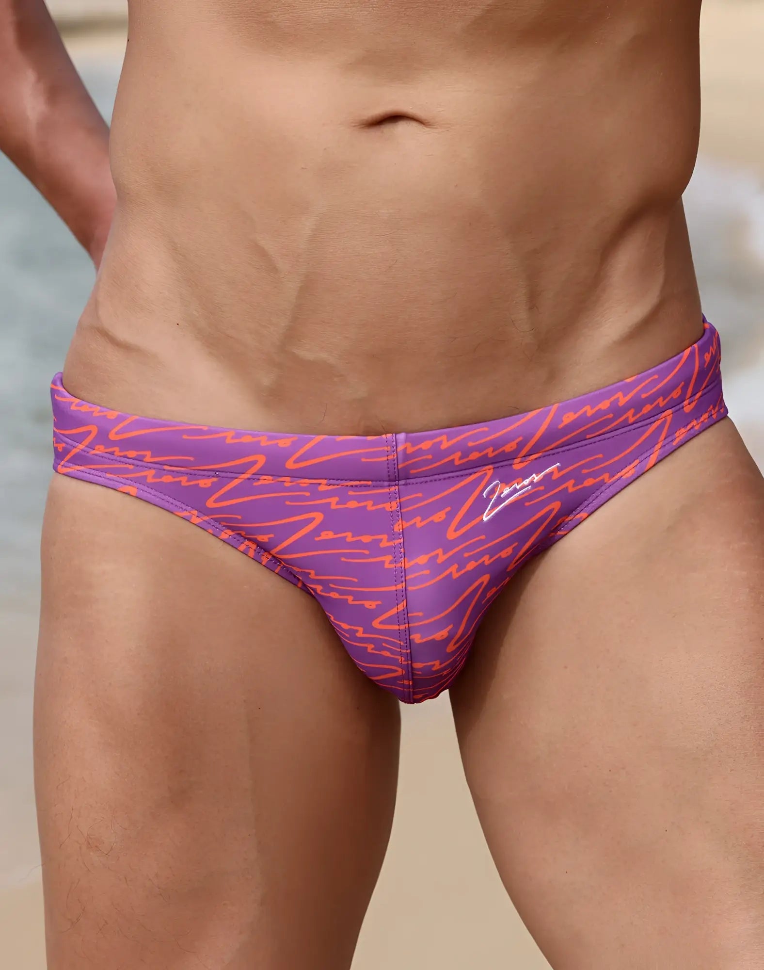 2eros v20 printed swim briefs in signature purple with a sleek modern design and purple and orange pattern