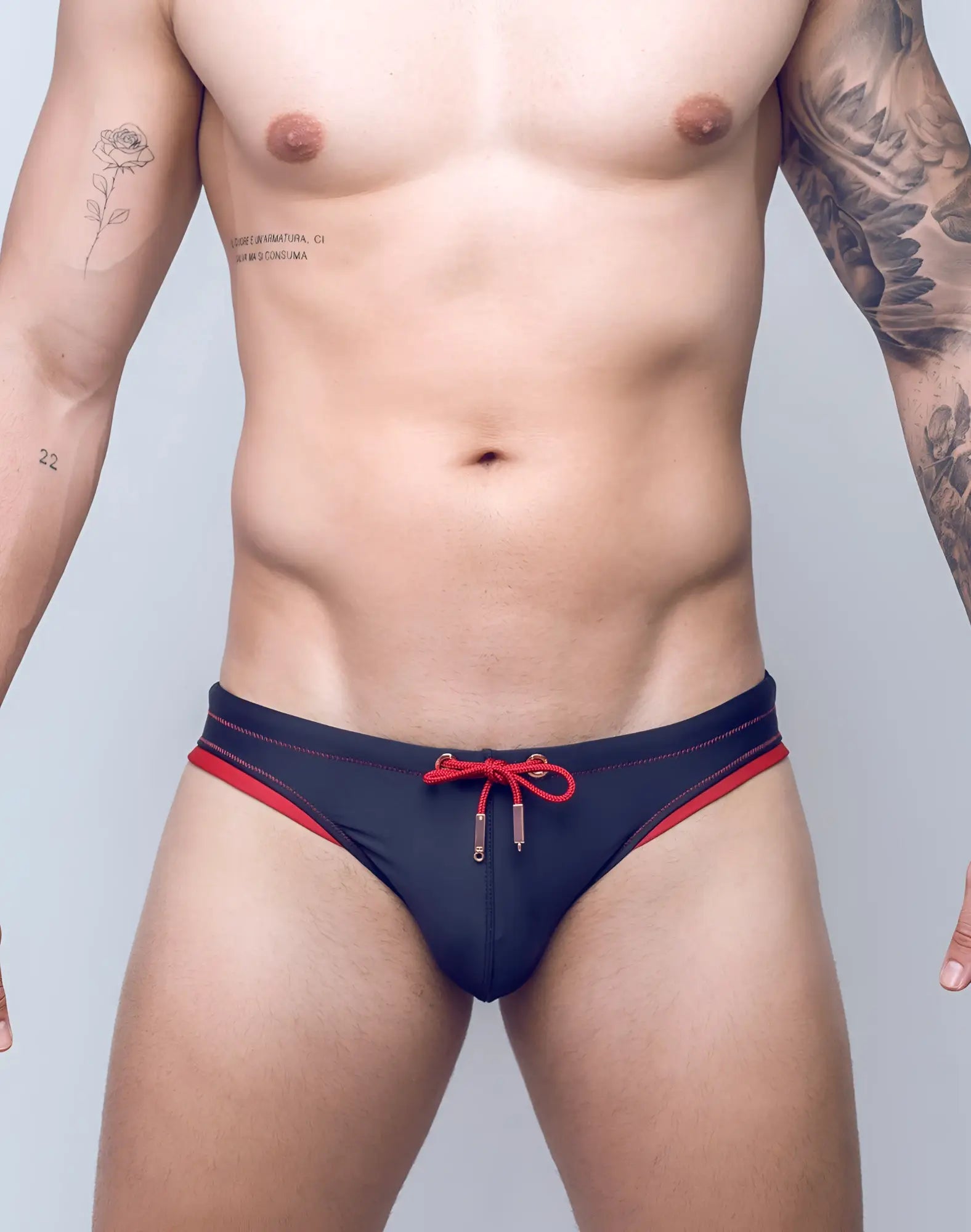 Navy blue 2EROS V22 Rapid swim briefs with red trim and matching front drawstring tie for swimming