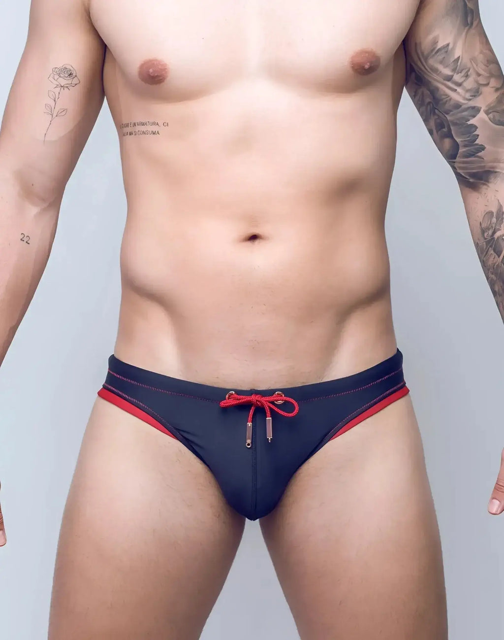 Navy blue 2EROS V22 Rapid swim briefs with red trim and matching front drawstring tie for swimming