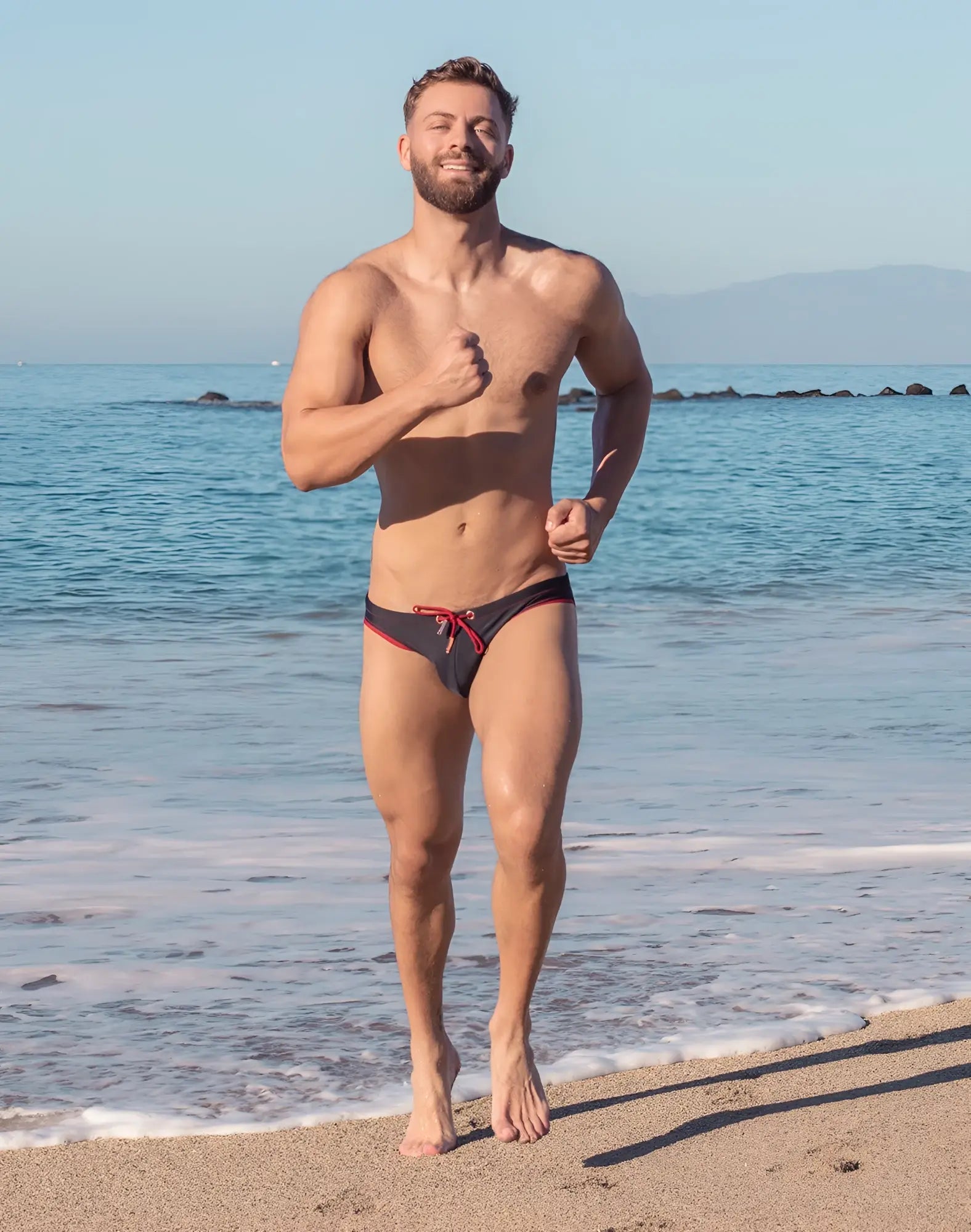 2eros v22 rapid swim brief in black with red drawstrings featuring a quick-dry fabric design for swimming