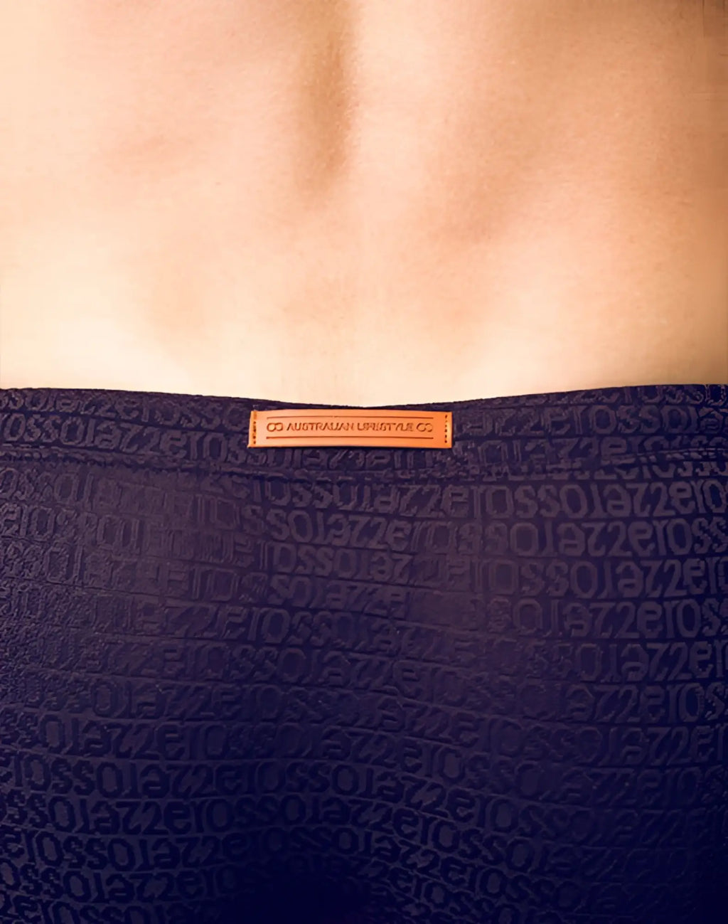 Dark navy blue 2eros v30 textured swim brief with subtle pattern and orange australian lifestyle co leather label
