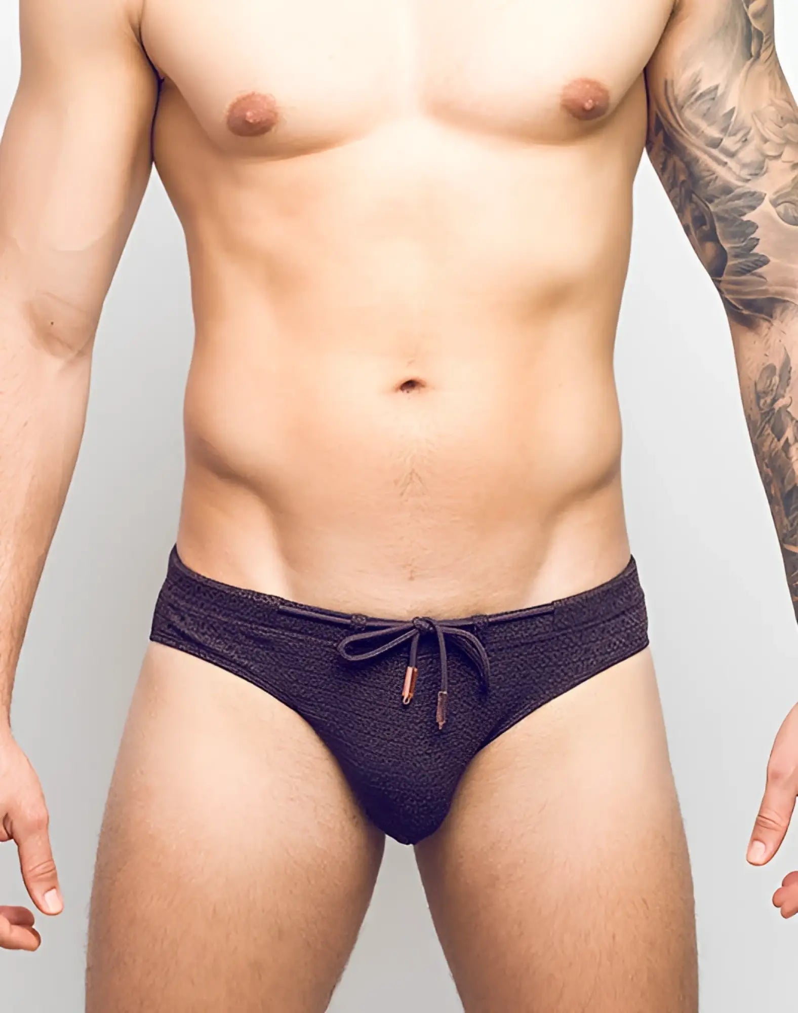 Dark textured 2EROS V30 textured swim brief in signet black with drawstring waist and metallic aglets