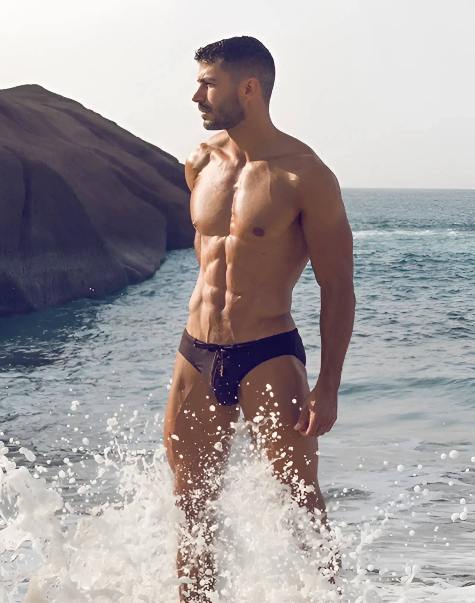 Black 2eros v30 textured swim brief with drawstring waistband designed for comfortable swimming and beach use