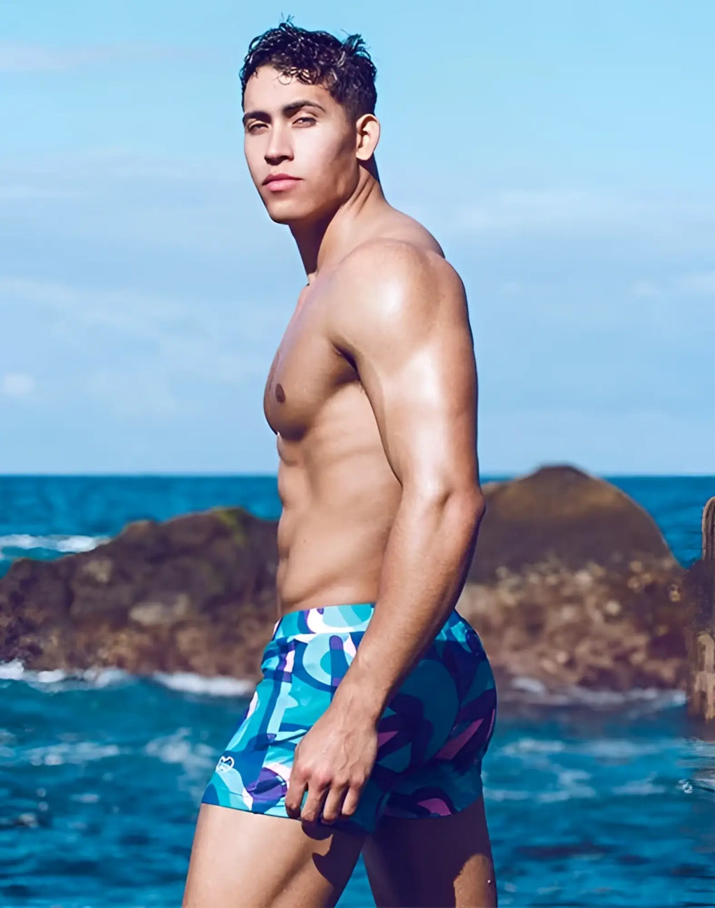 Blue and purple patterned 2EROS V60 Bondi Print swim trunks with modern abstract design and comfortable fabric for swimming